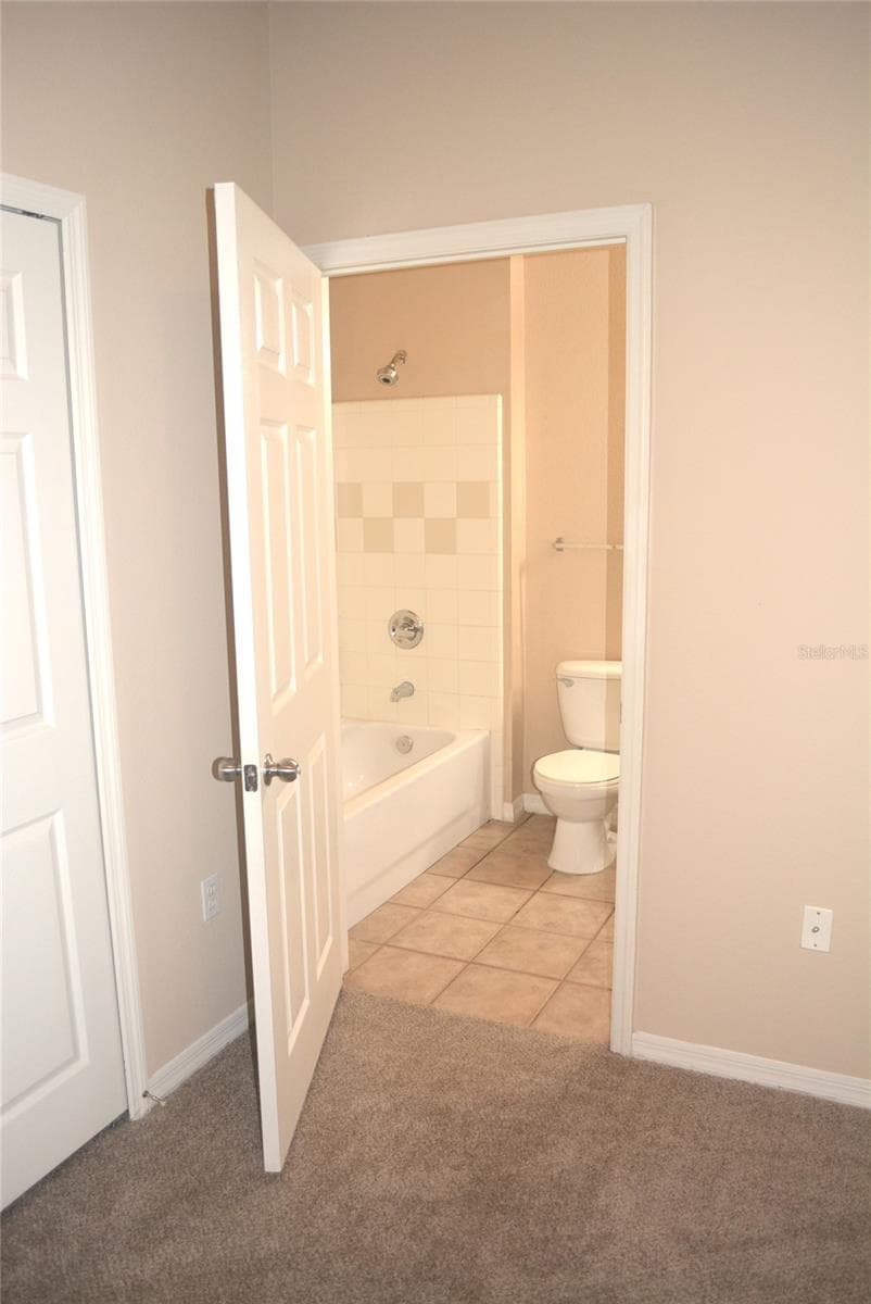 Access to 2nd Bathroom from 2nd Bedroom - 5701 SOLDIER CIR #104, SARASOTA