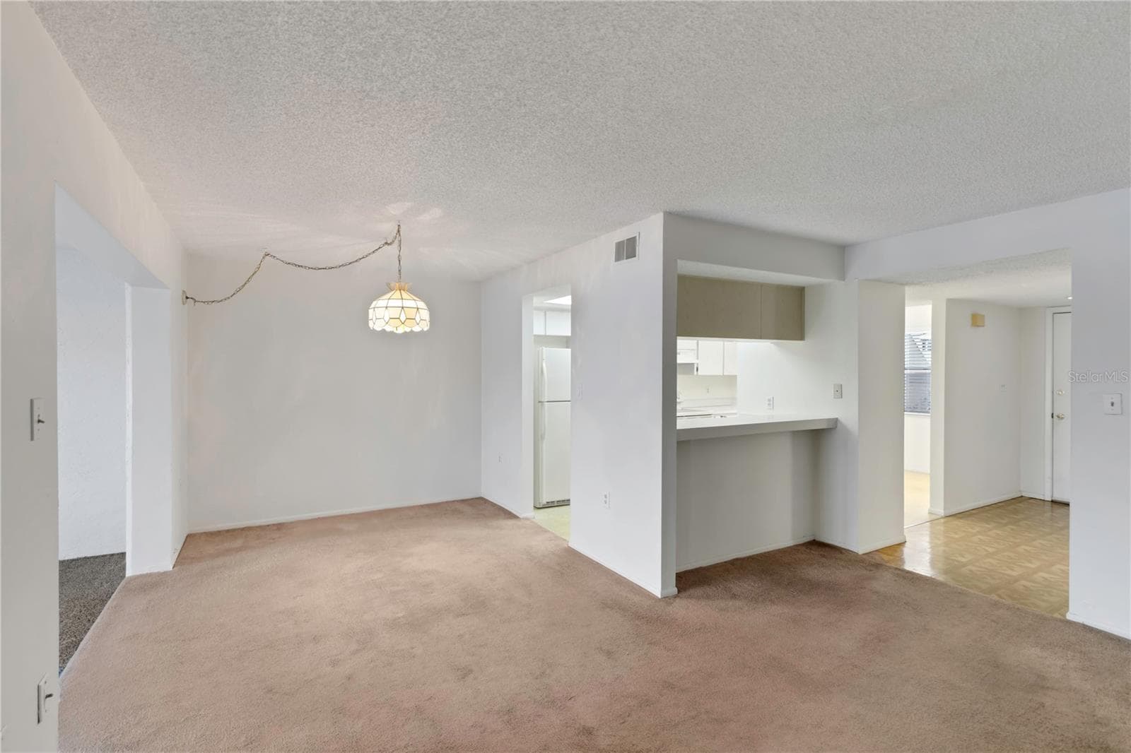 Living Room - Reverse View - 1034 BOWSPRIT LN, HOLIDAY