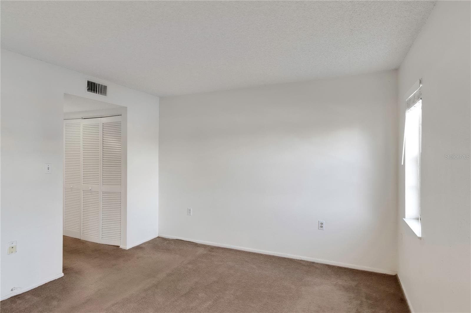 Master Bedroom - 1034 BOWSPRIT LN, HOLIDAY