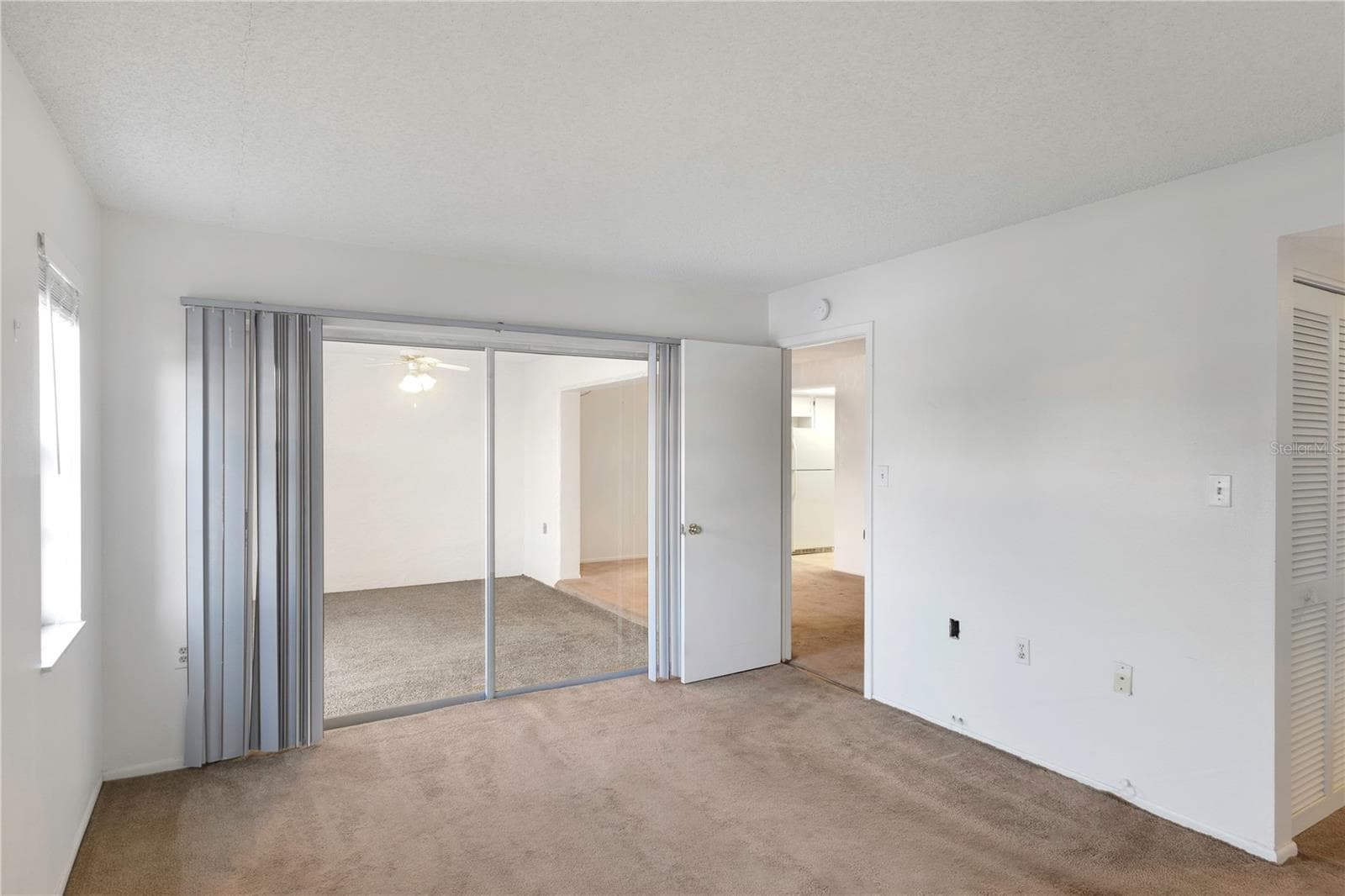 Master Bedroom - Reverse View - 1034 BOWSPRIT LN, HOLIDAY