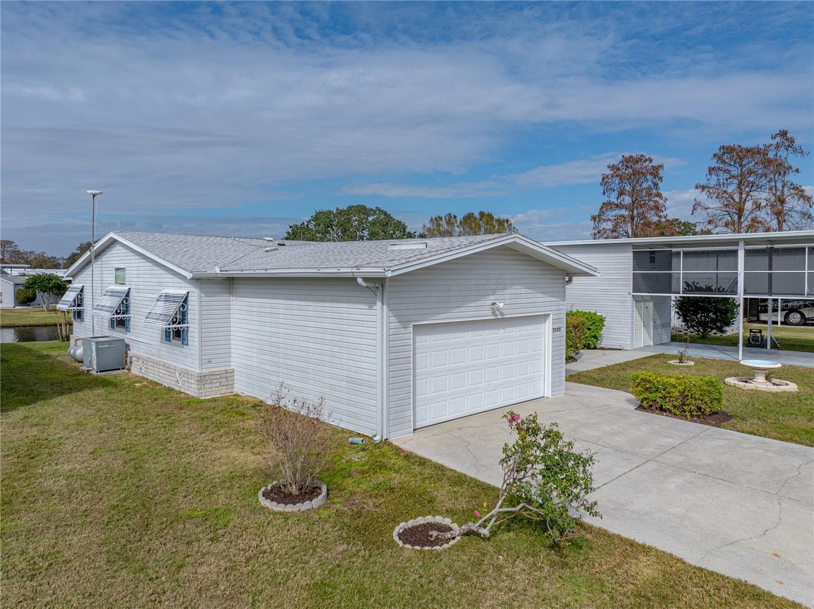 Manufactured Home at 5148 ISLAND VIEW CIR N, POLK CITY, photo 7 of 100