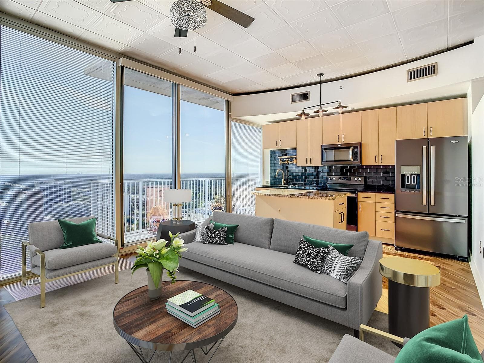 kitchen/living room virtually staged - 155 S COURT AVE #2107, ORLANDO