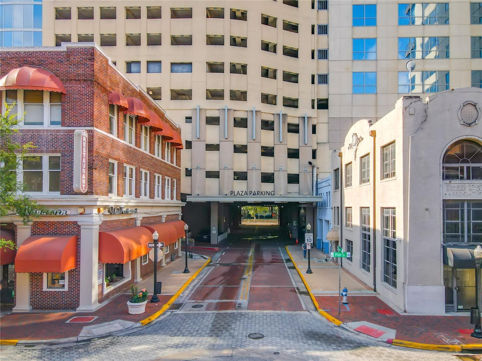 street entrance and 1 assigned parking space in the private covered garage. - 155 S COURT AVE #2107, ORLANDO