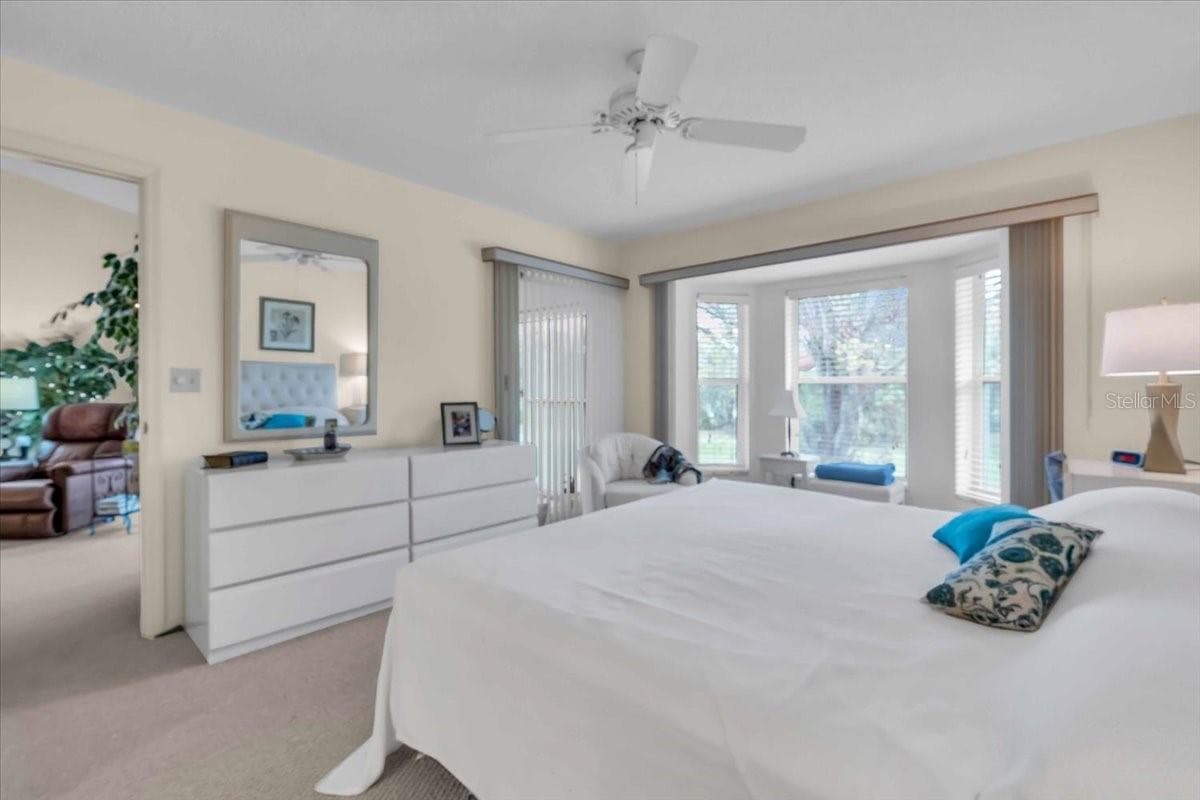 primary bedroom - 6713 STONE RIVER RD #206, BRADENTON