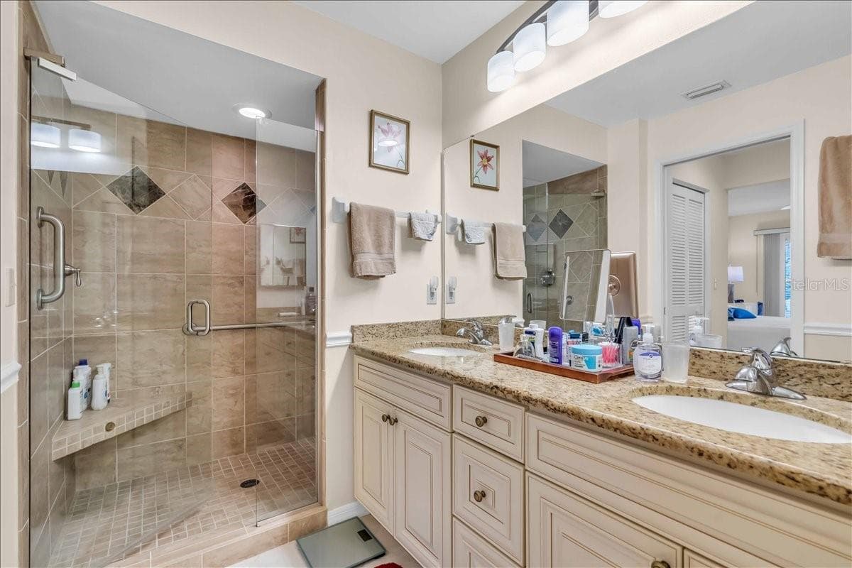 lanai looking out to golf course - 6713 STONE RIVER RD #206, BRADENTON