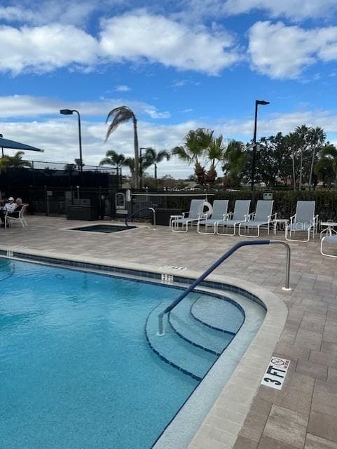 Club's main pool - 6713 STONE RIVER RD #206, BRADENTON