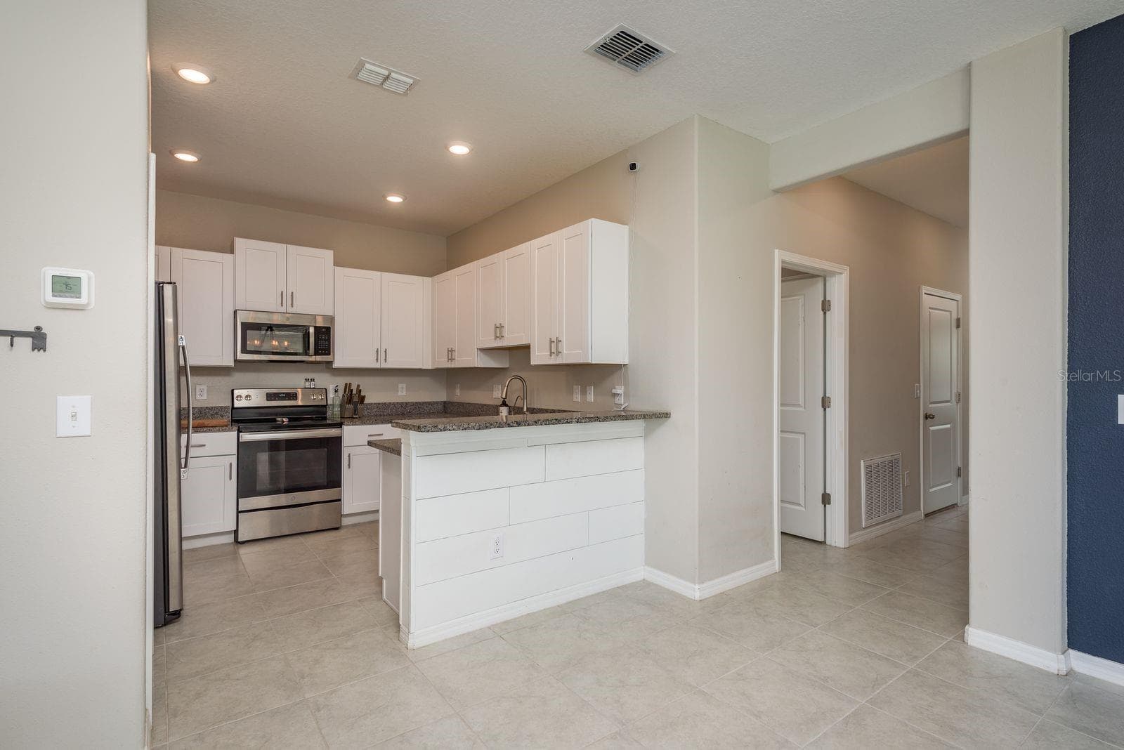 Villa at 13387 CREST LAKE DR, HUDSON, photo 11 of 32