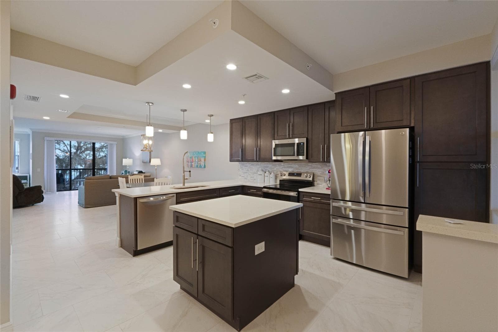 Open floor plan with view through to the lake. - 16300 COUNTY ROAD 455 #305, MONTVERDE
