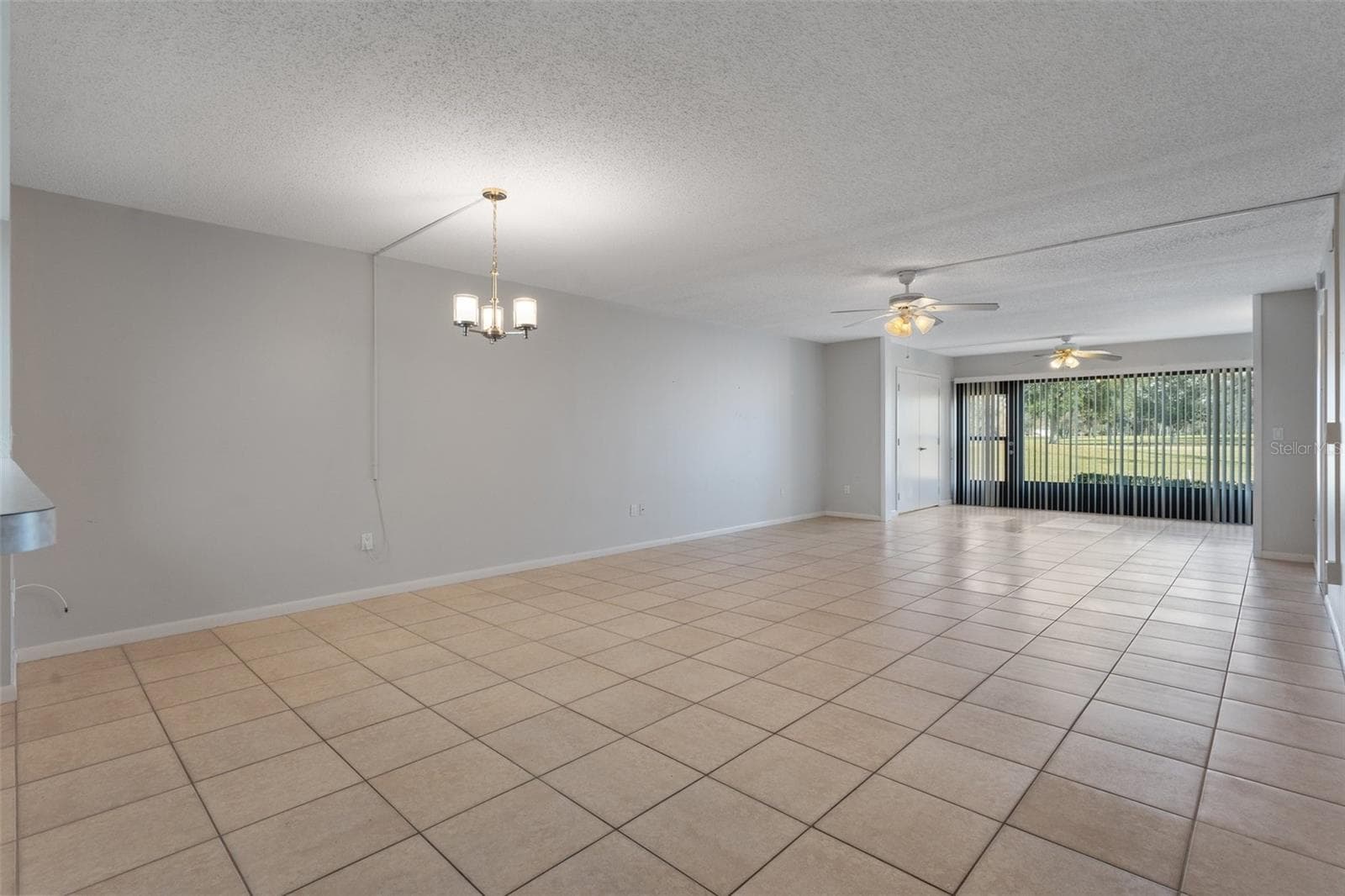 Dining and living room - 3 CYPRESS RUN #35A, HOMOSASSA