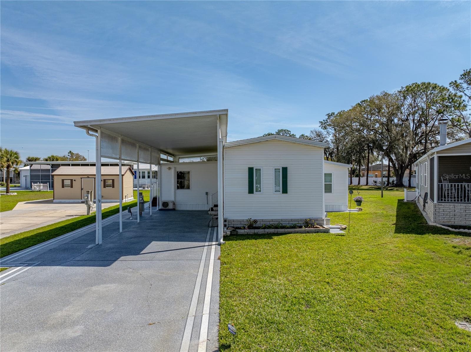 Manufactured Home at 8925 SOUTHSHORE CT, POLK CITY, photo 2 of 88