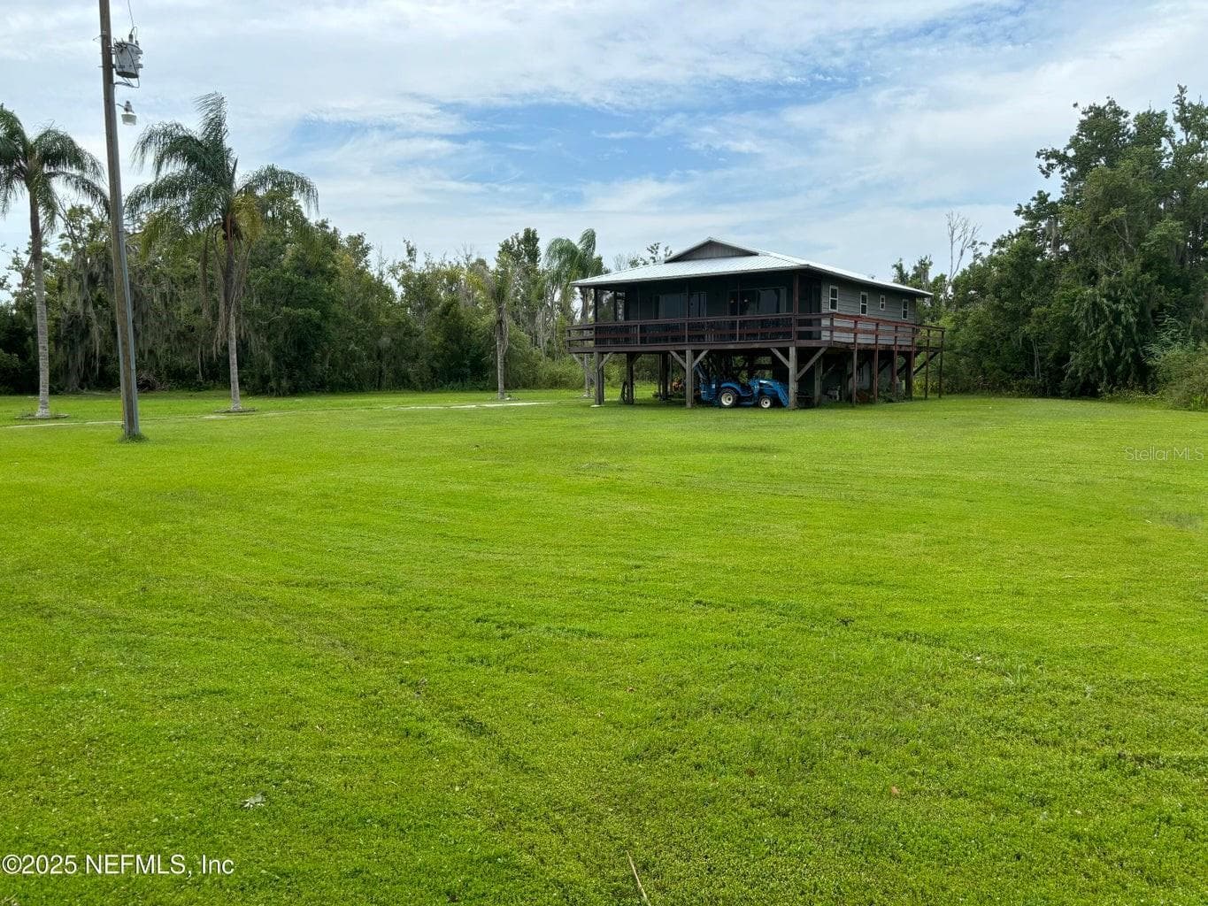 Front Yard of Home - 6001 BIRD ISLAND DR, LADY LAKE