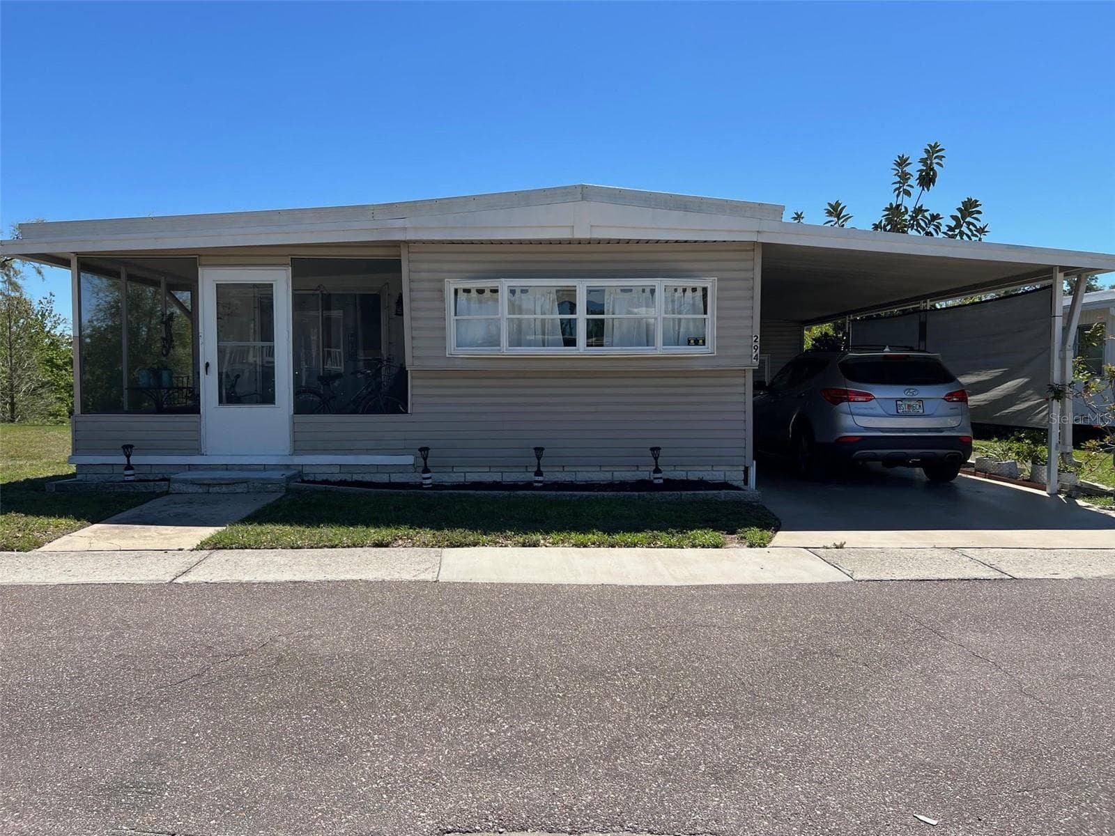 Mobile Home at 29250 US HIGHWAY 19 N #294, CLEARWATER, photo 2 of 31