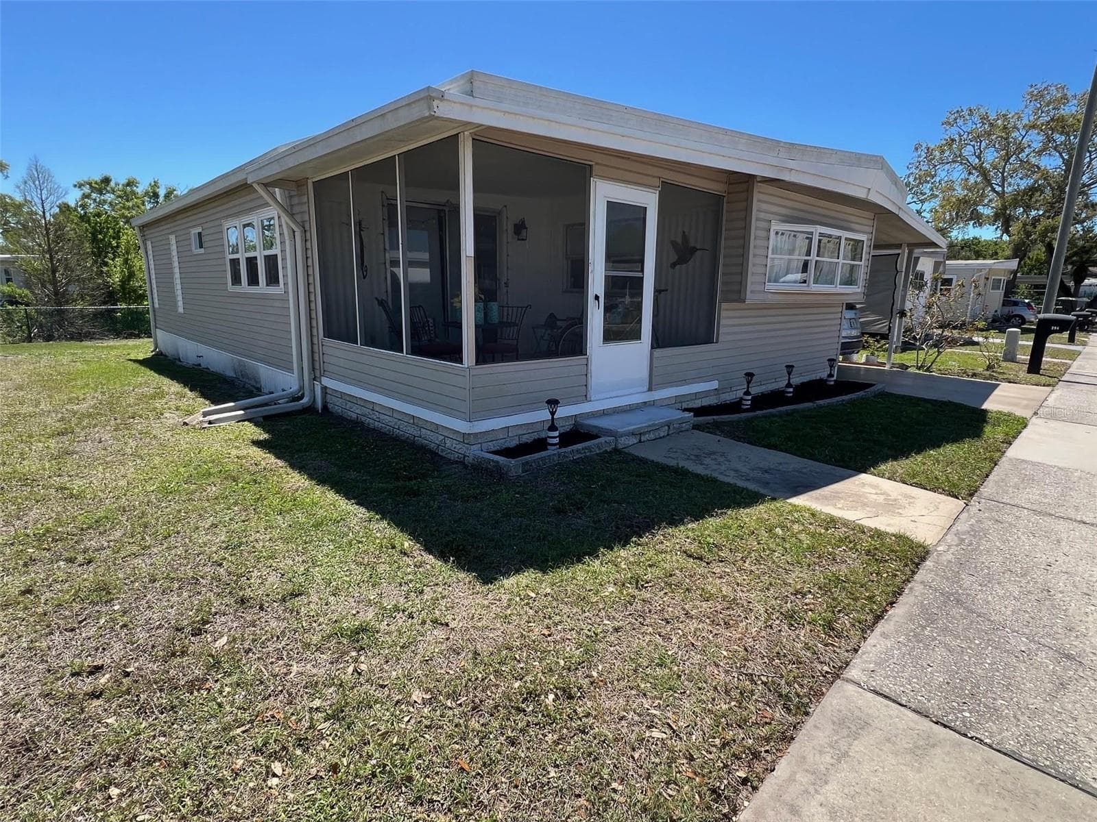 Mobile Home at 29250 US HIGHWAY 19 N #294, CLEARWATER, photo 3 of 31