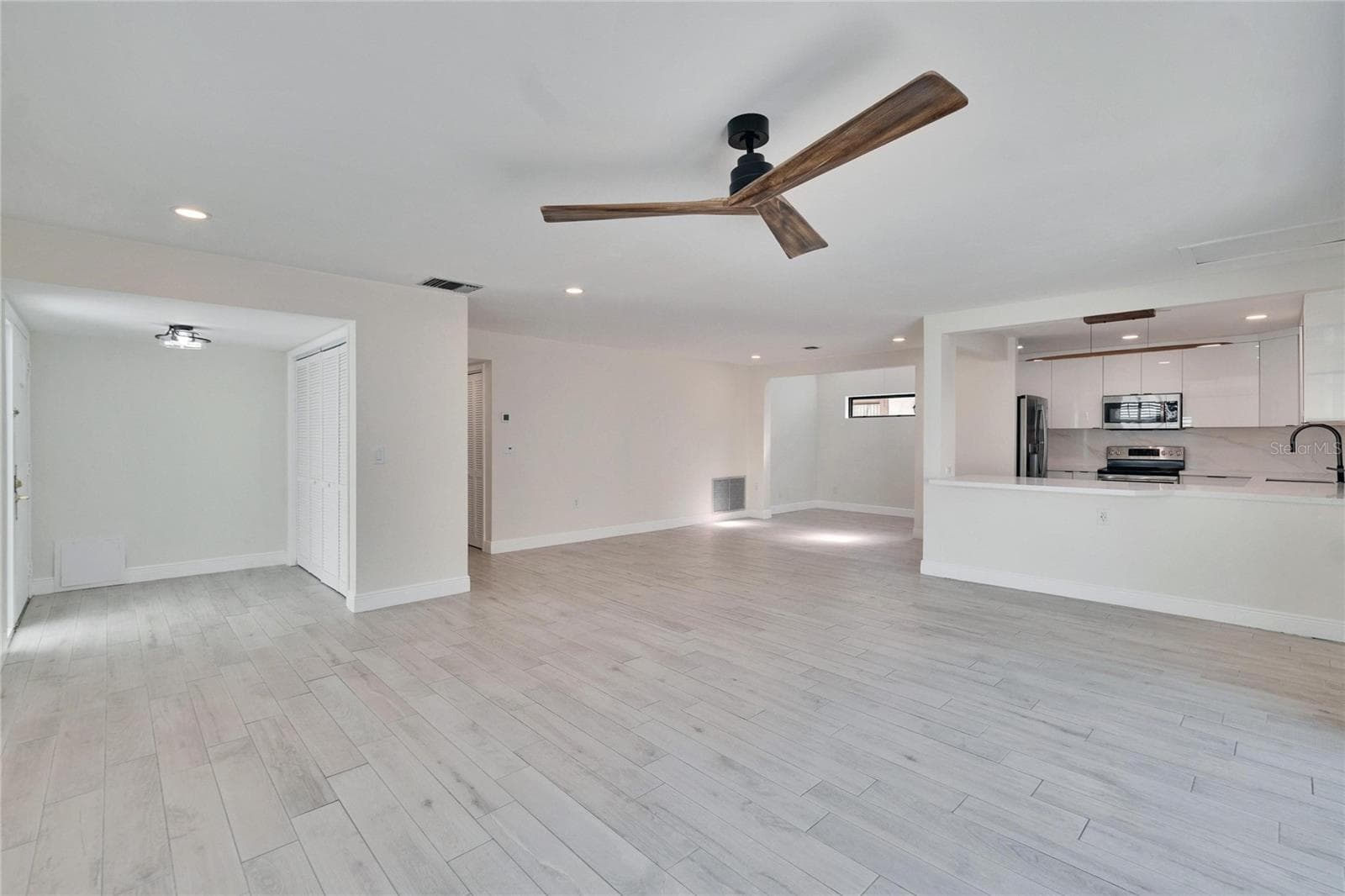 Great Room, Kitchen & Dining Room - 370 S WOODLANDS DR, OLDSMAR