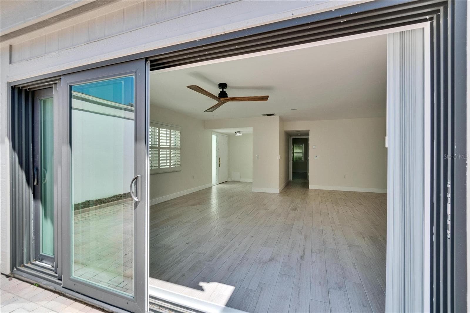 Sliders into the Great Room - 370 S WOODLANDS DR, OLDSMAR