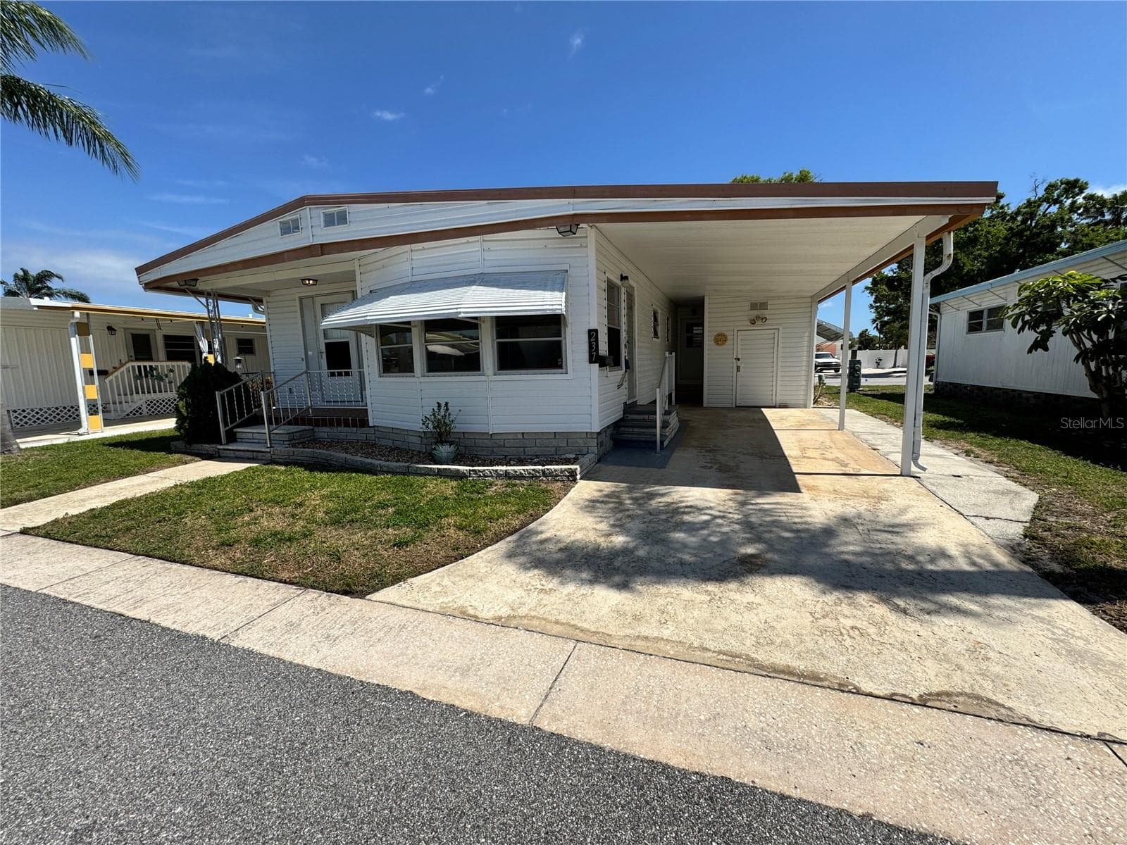 Mobile Home at 2331 BELLEAIR RD #Lot 237, CLEARWATER, photo 3 of 35
