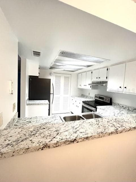 Kitchen: New formica counters and appliances - 2538 CITRUS CLUB LN #105, ORLANDO