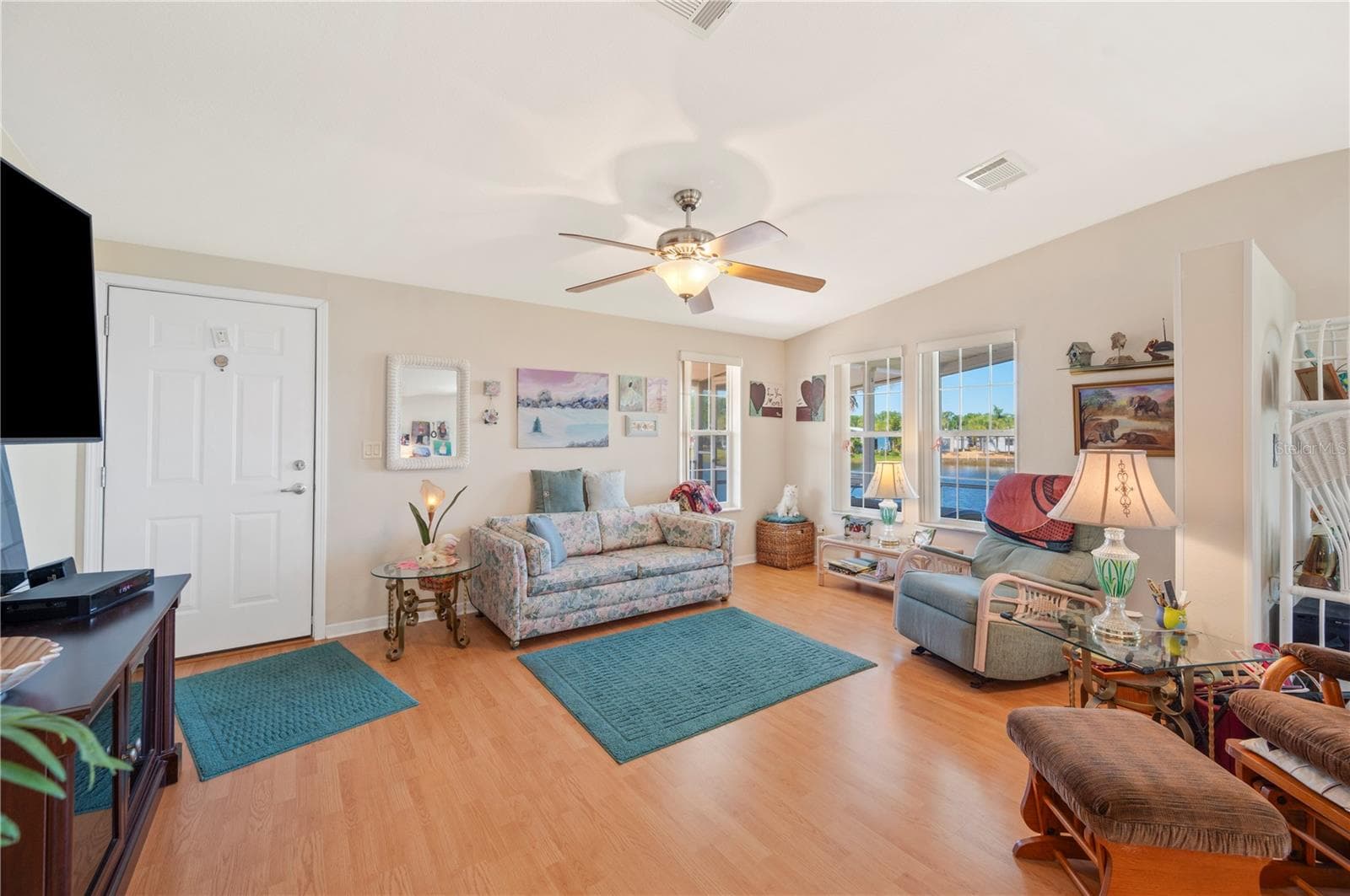 Living room, open up to the dining room - 38 QUEEN OF WATERS ST, LAKE WALES