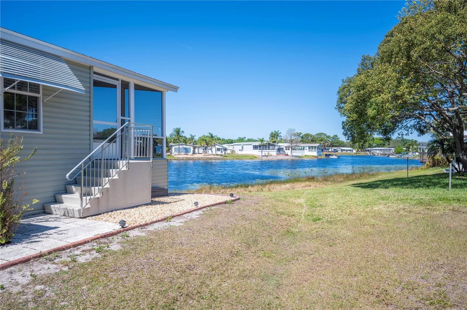 Greenway next to your new home, giving you the feeling of space between you and your neighbor! - 38 QUEEN OF WATERS ST, LAKE WALES
