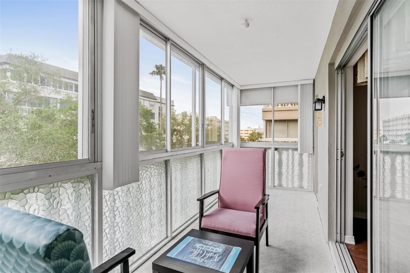 Covered patio - 147 BLUFF VIEW DR #206, BELLEAIR BLUFFS