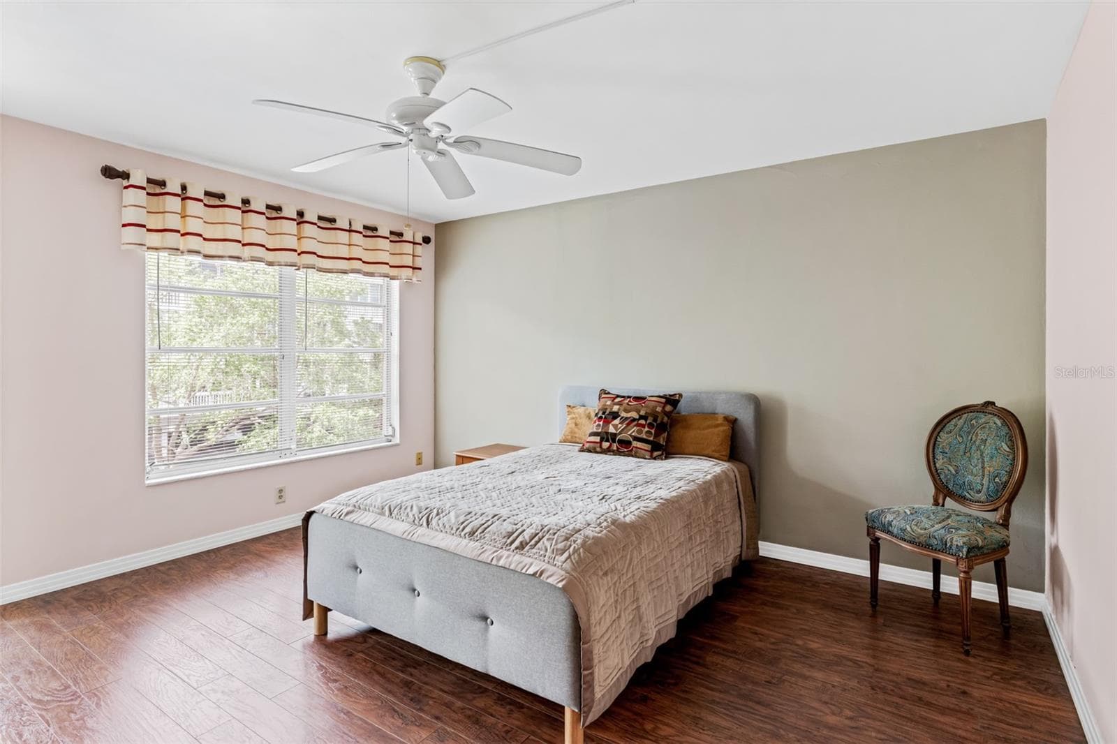 Primary bedroom with balcony access - 147 BLUFF VIEW DR #206, BELLEAIR BLUFFS