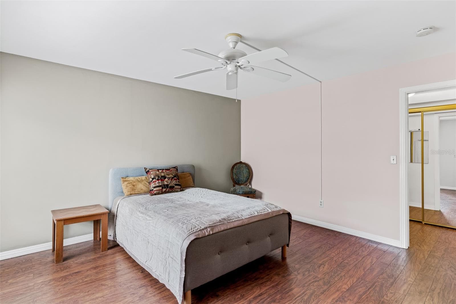 Primary bedroom with balcony access - 147 BLUFF VIEW DR #206, BELLEAIR BLUFFS