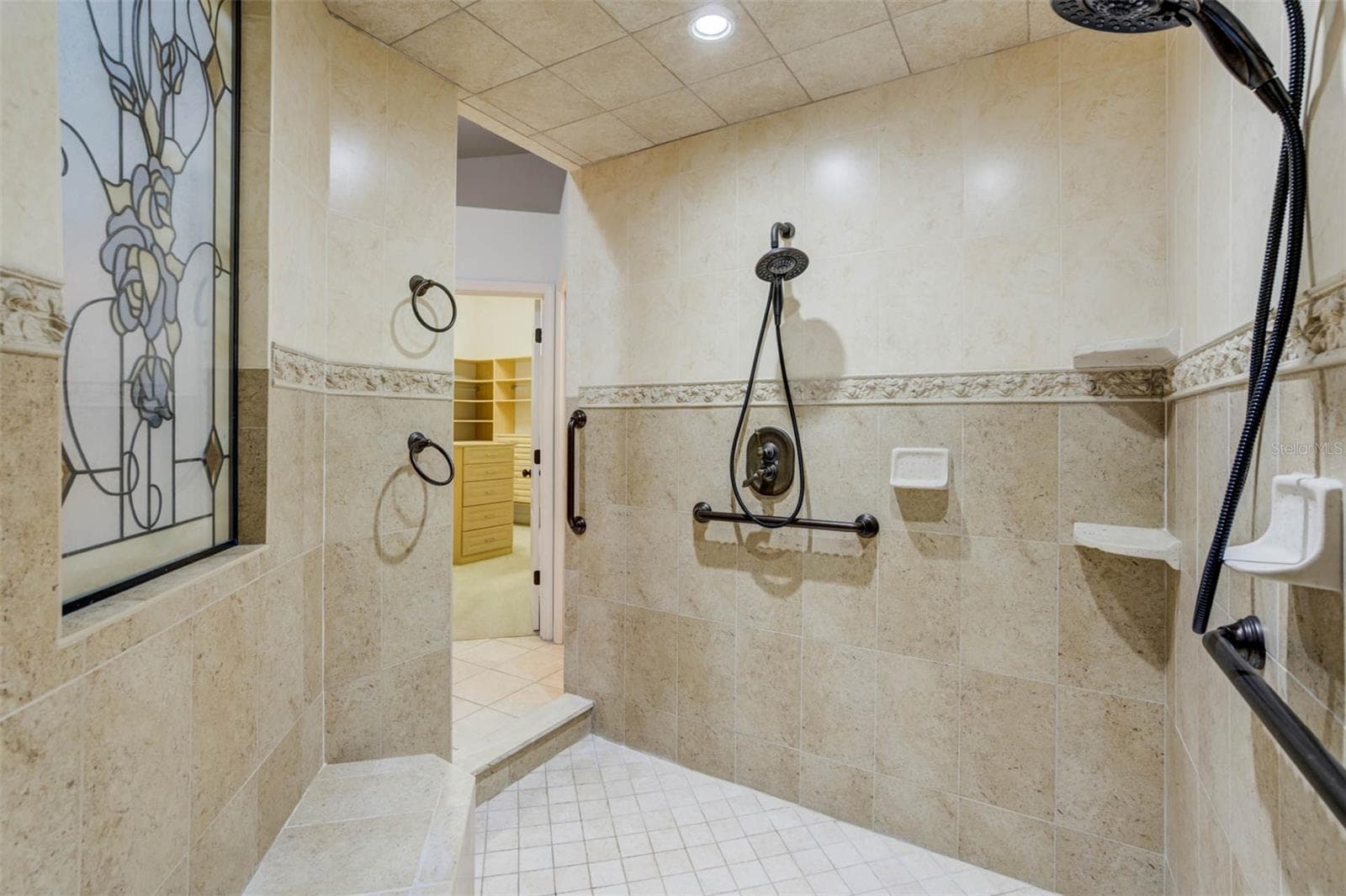 spacious shower with multiple shower heads - 701 E 60 HWY, PLANT CITY