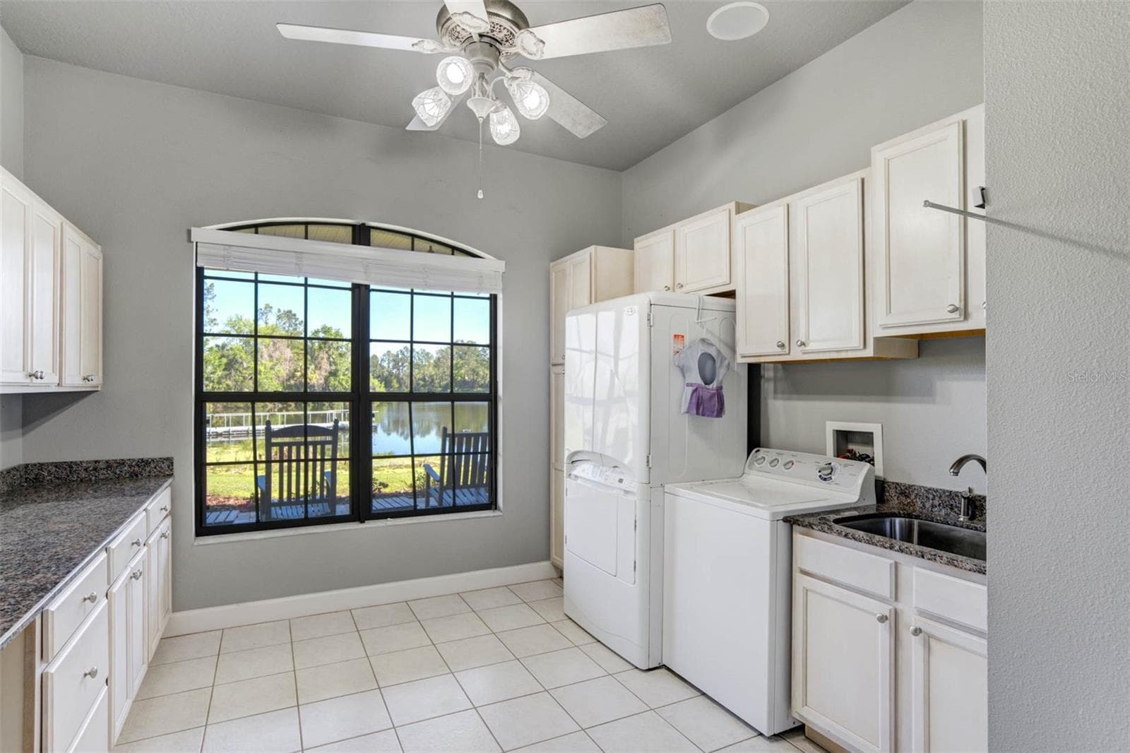 Amazing Laundry room with steamer closet and custom cabinetry - 701 E 60 HWY, PLANT CITY