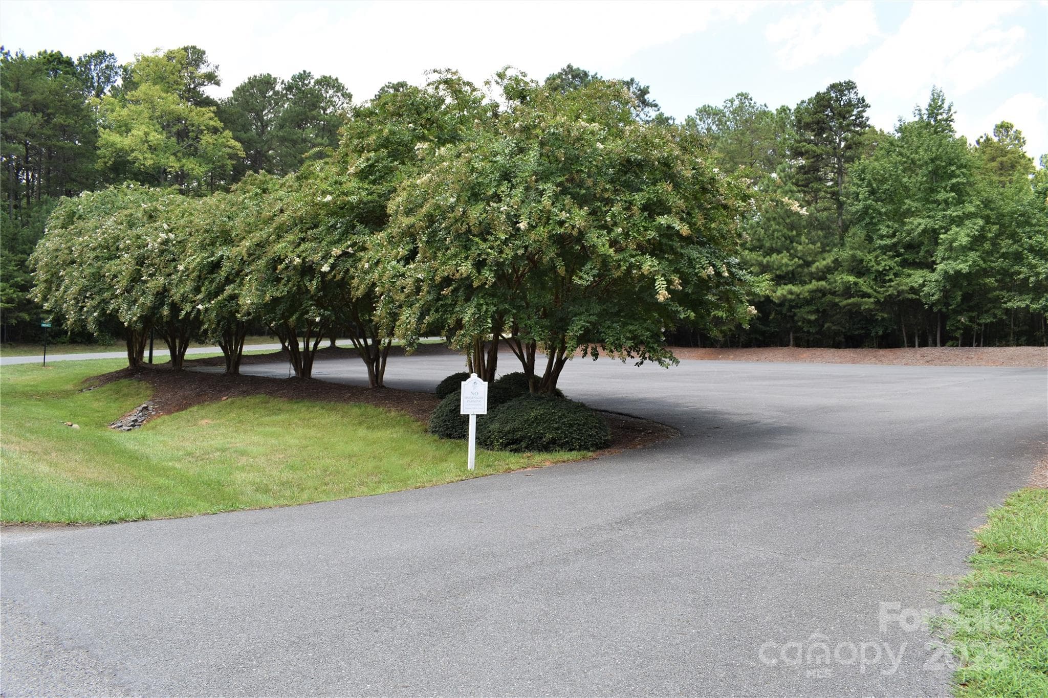 Additional parking across the street from the Clubhouse. - 133 Badin View Drive, Badin Lake