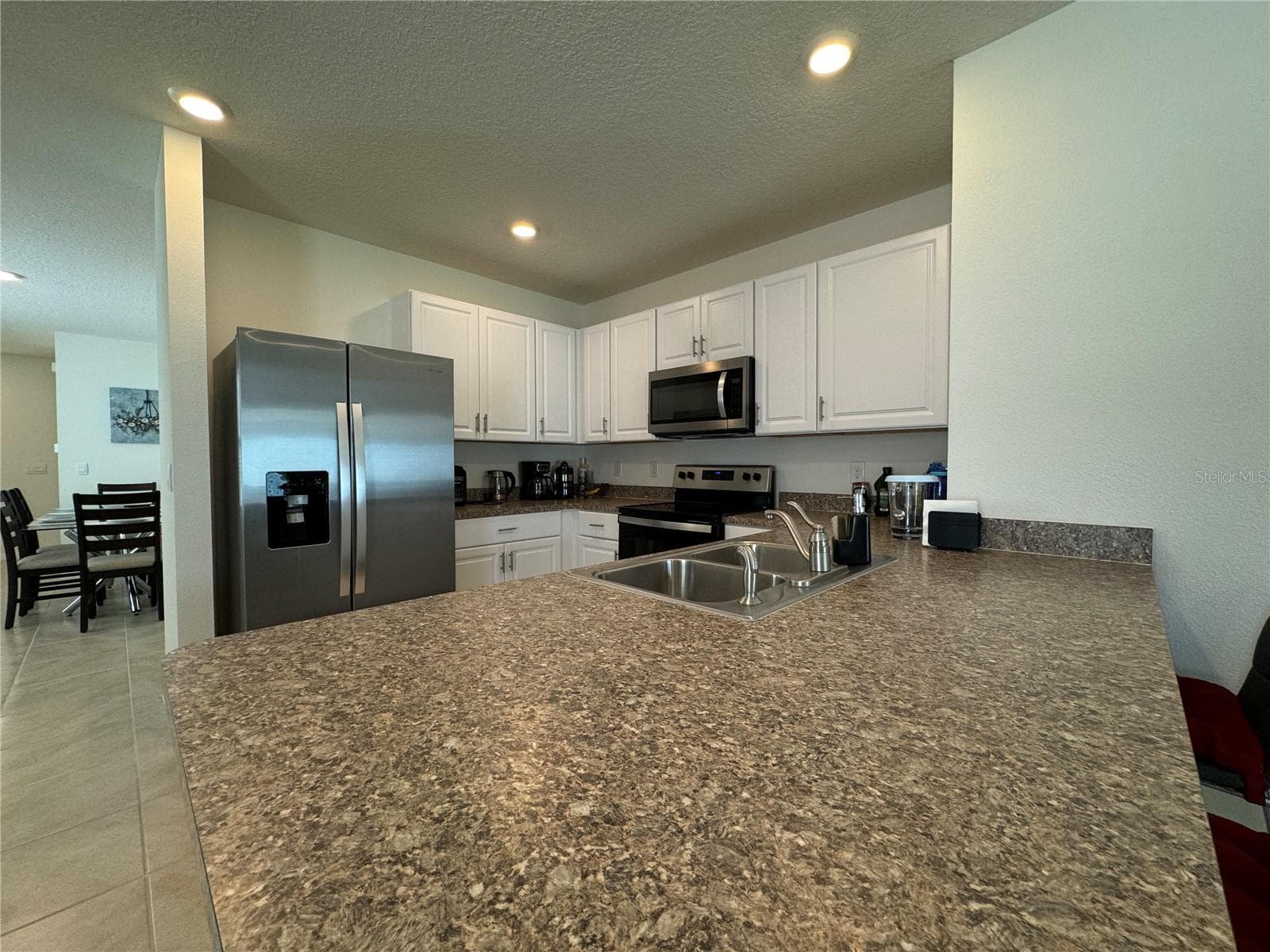 Single Family Residence at 1648 HEART BAR RD, KISSIMMEE, photo 8 of 77