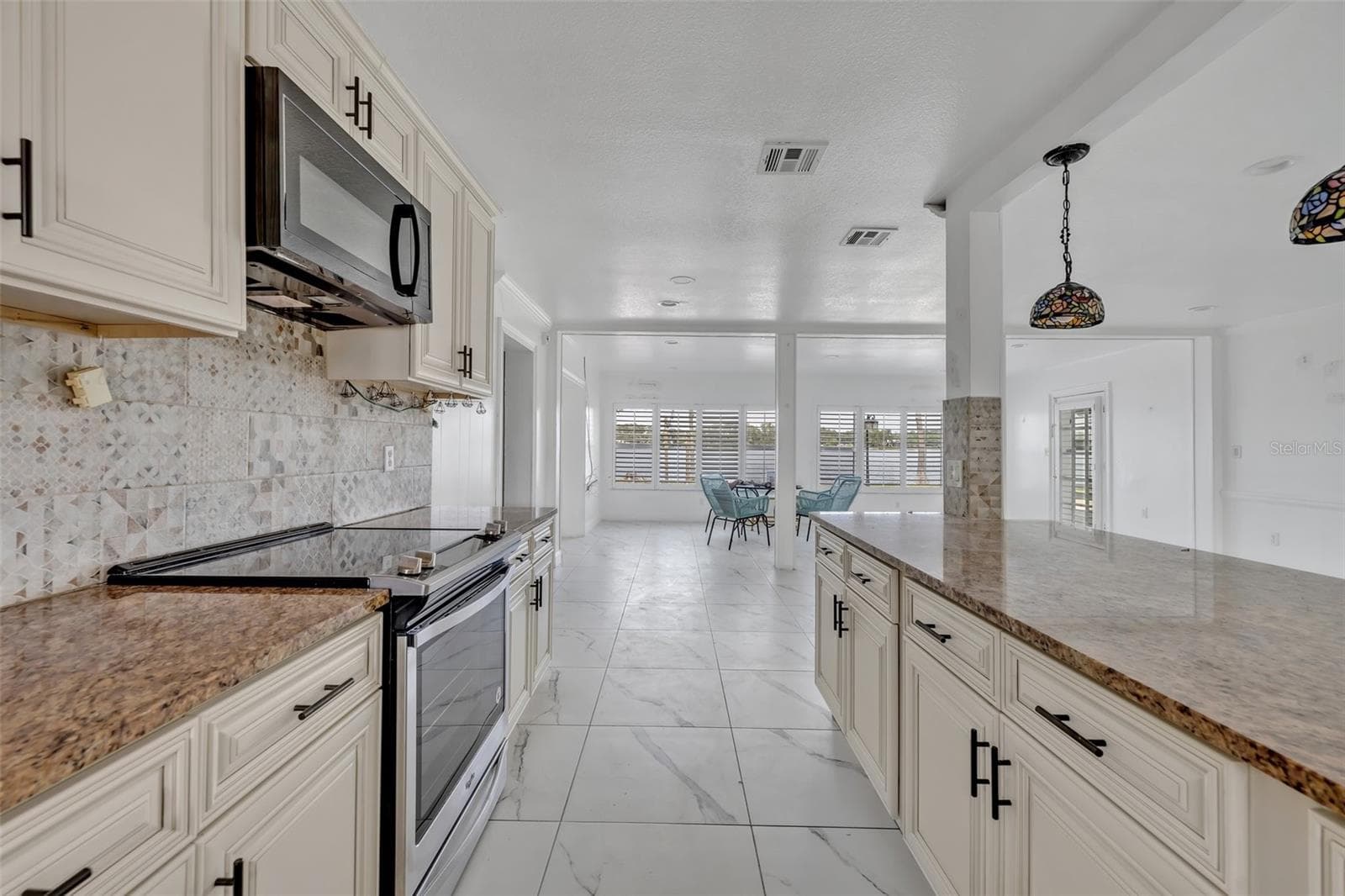Single Family Residence at 7420 LAKE WILLIS DR, ORLANDO, photo 14 of 41