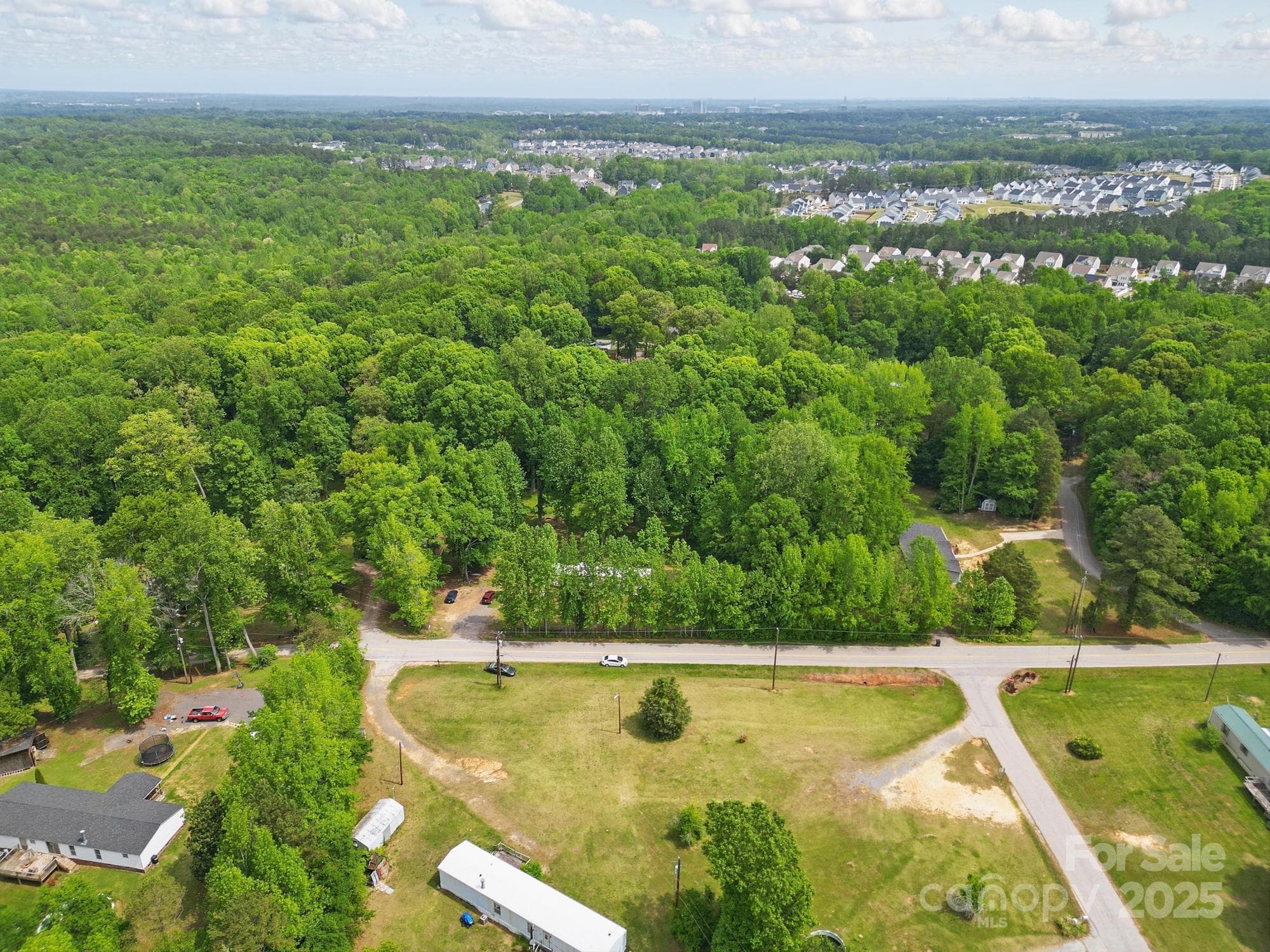 Aerial view of tree line view of the front of subject yard - 10420 Silver Mine Road, Indian Land