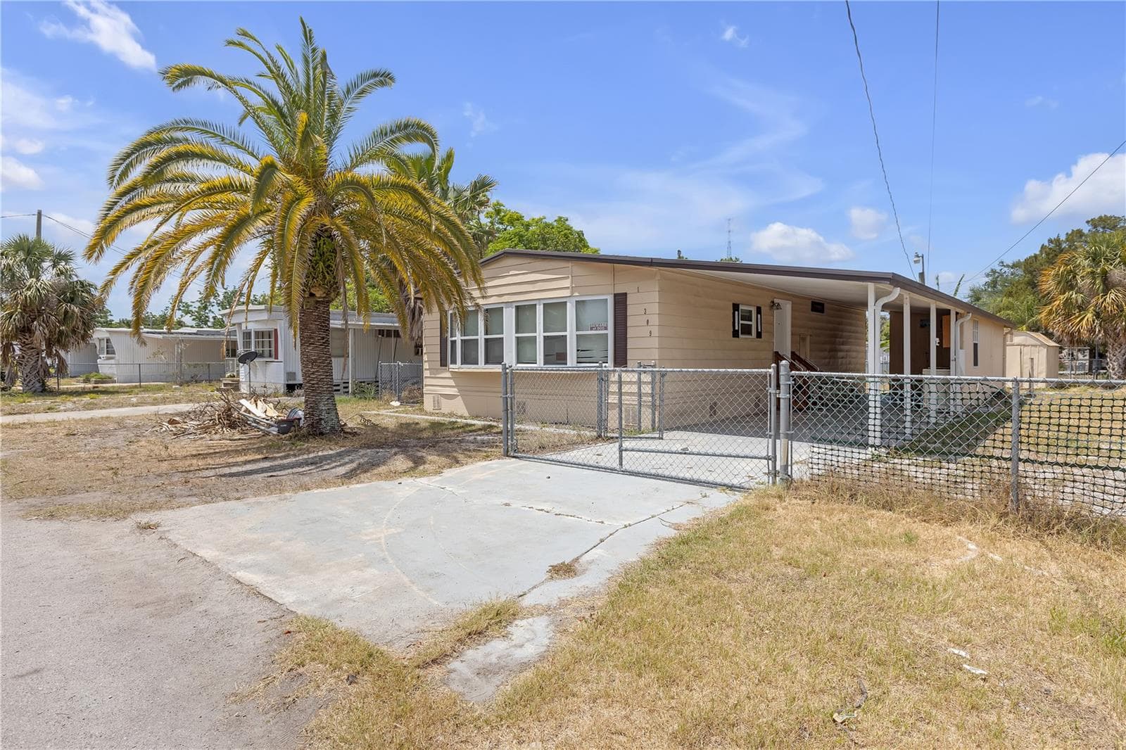 Manufactured Home at 11309 LEISURE LN, PORT RICHEY, photo 2 of 34