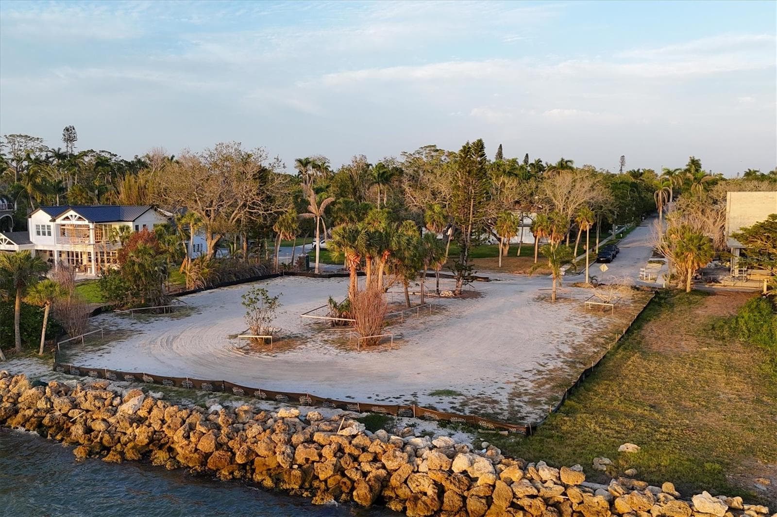 Lot lines extend beyond black silt fence - 603 INDIAN BEACH LN, SARASOTA