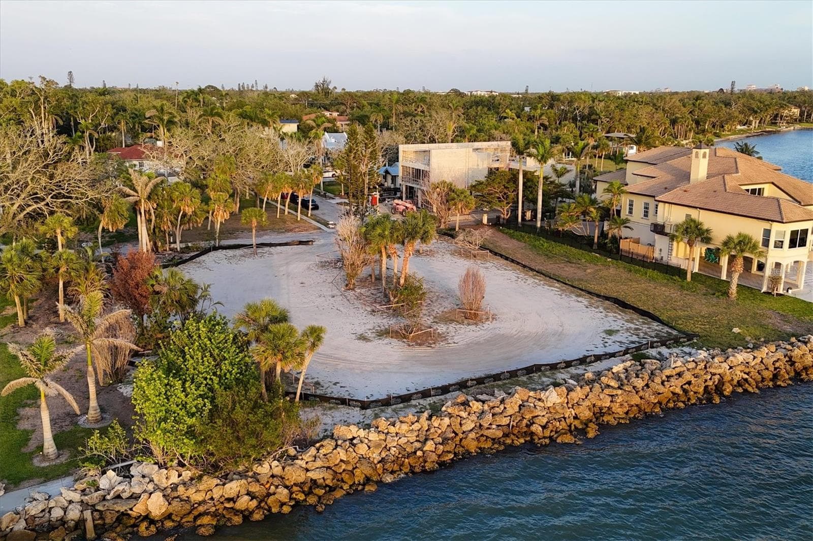 Lot lines extend beyond black silt fence - 603 INDIAN BEACH LN, SARASOTA