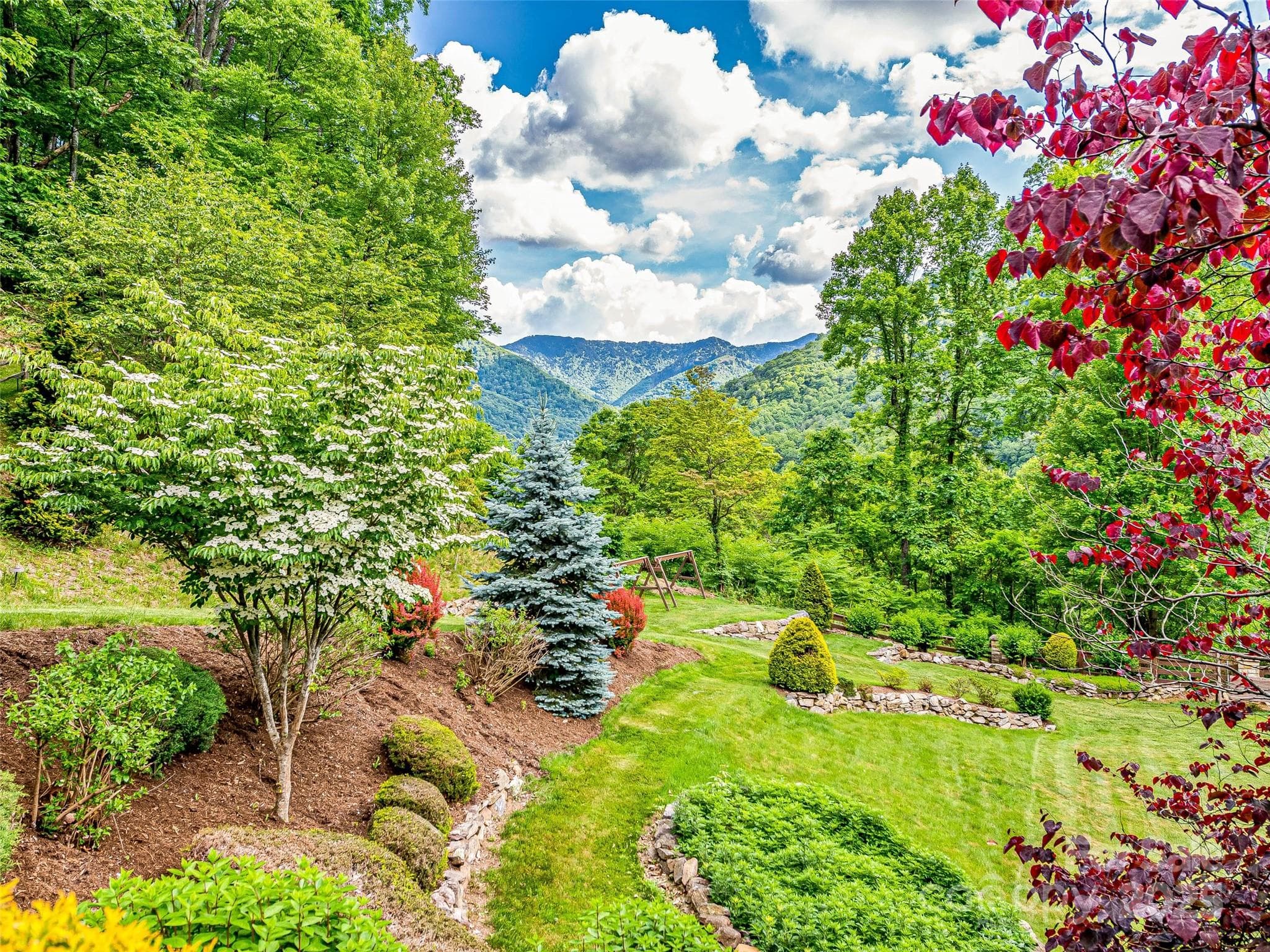 Year round beauty with mature landscaping. - 202 Emerald Lane, Maggie Valley