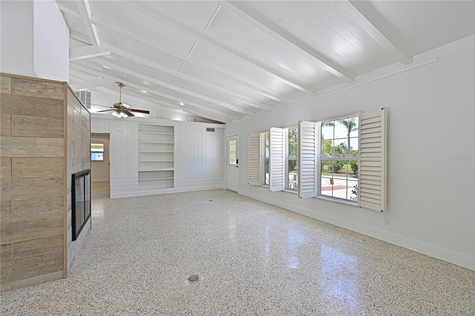 Living room plantation shutters - 5924 GULF OF MEXICO DR, LONGBOAT KEY
