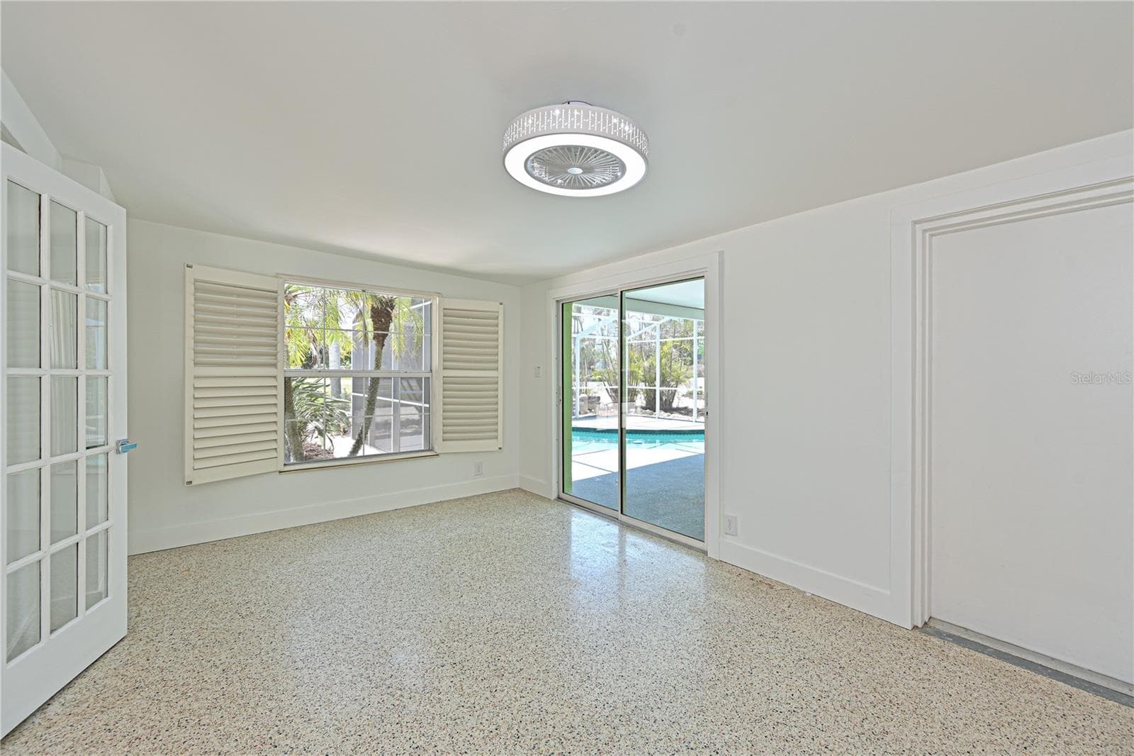 Family room plantation shutters - 5924 GULF OF MEXICO DR, LONGBOAT KEY