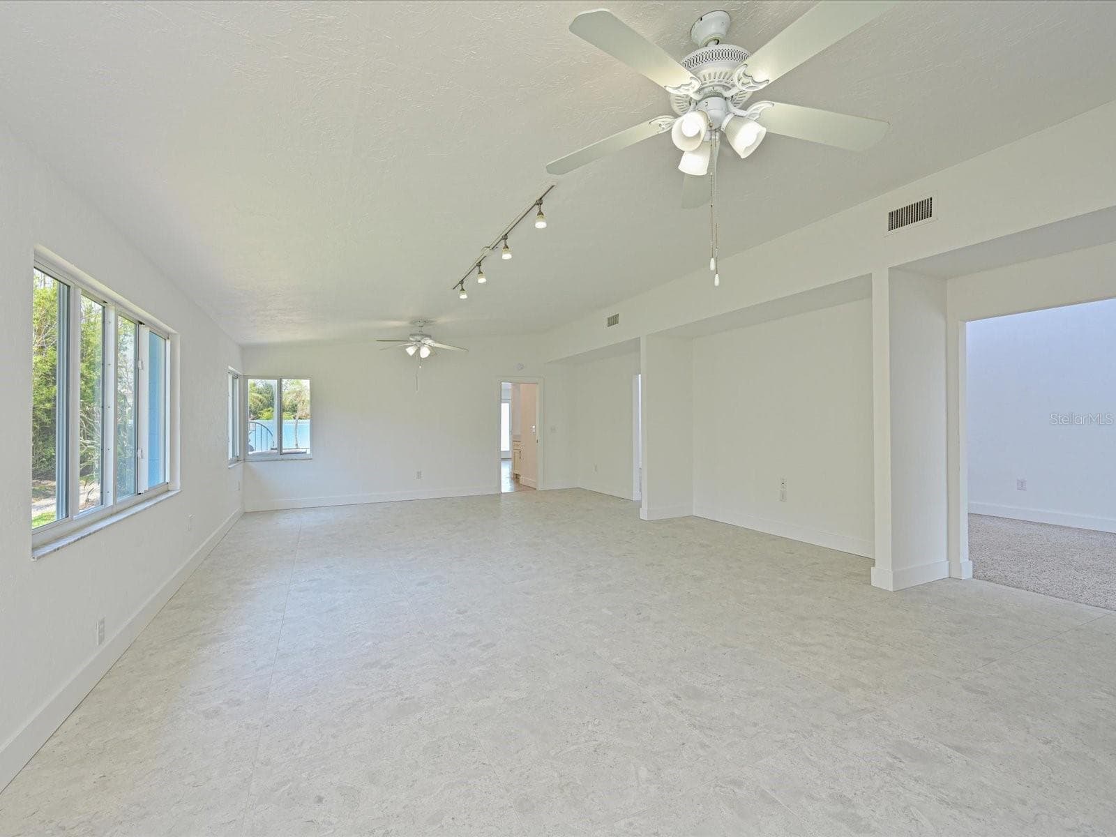 Family room view from fireplace hearth - 5920 GULF OF MEXICO DR, LONGBOAT KEY