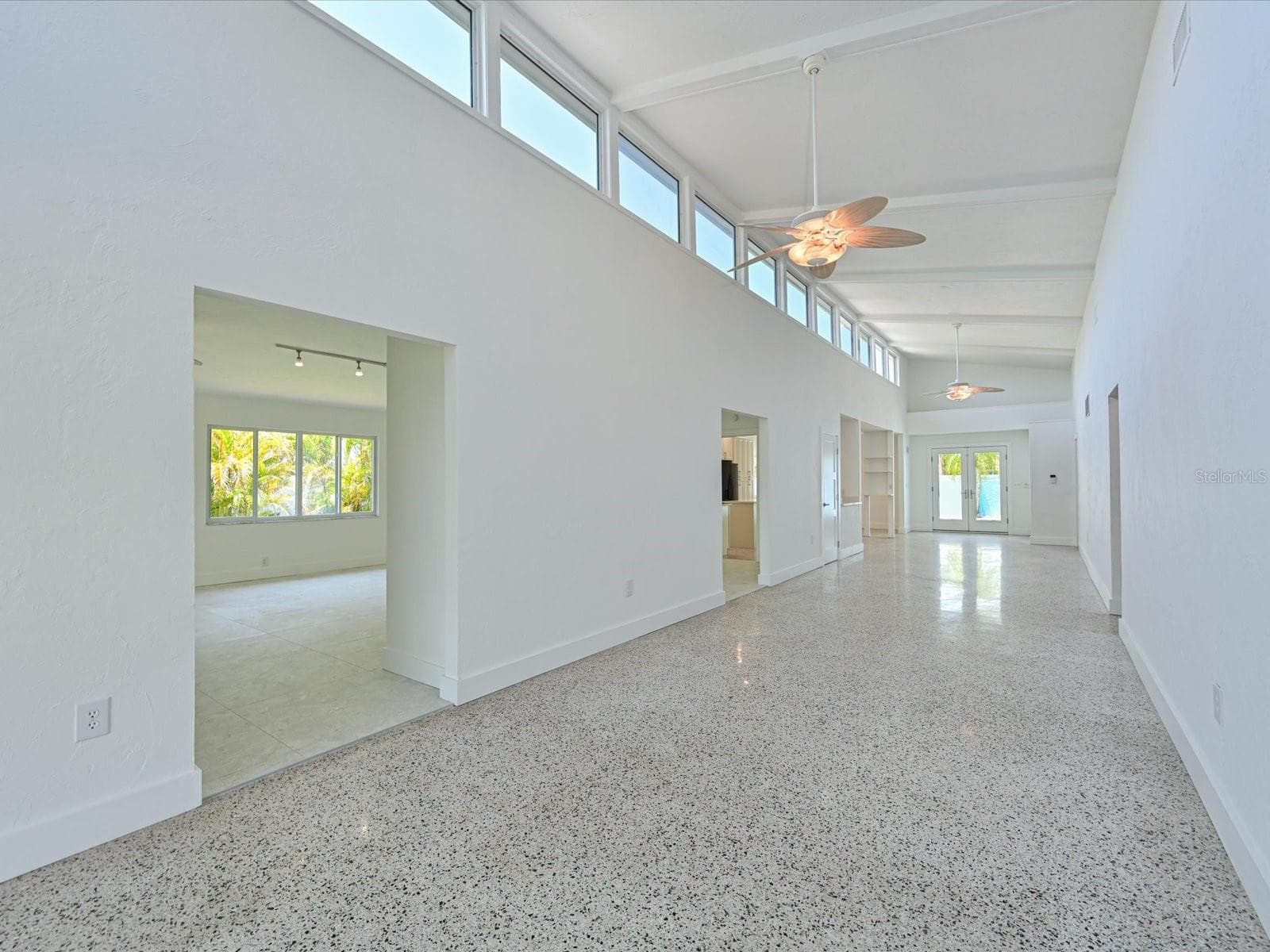 Grand foyer with upper windows for natural lighting - 5920 GULF OF MEXICO DR, LONGBOAT KEY