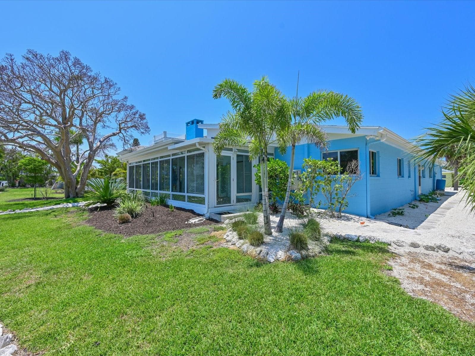 Enclosed lanai - 5920 GULF OF MEXICO DR, LONGBOAT KEY