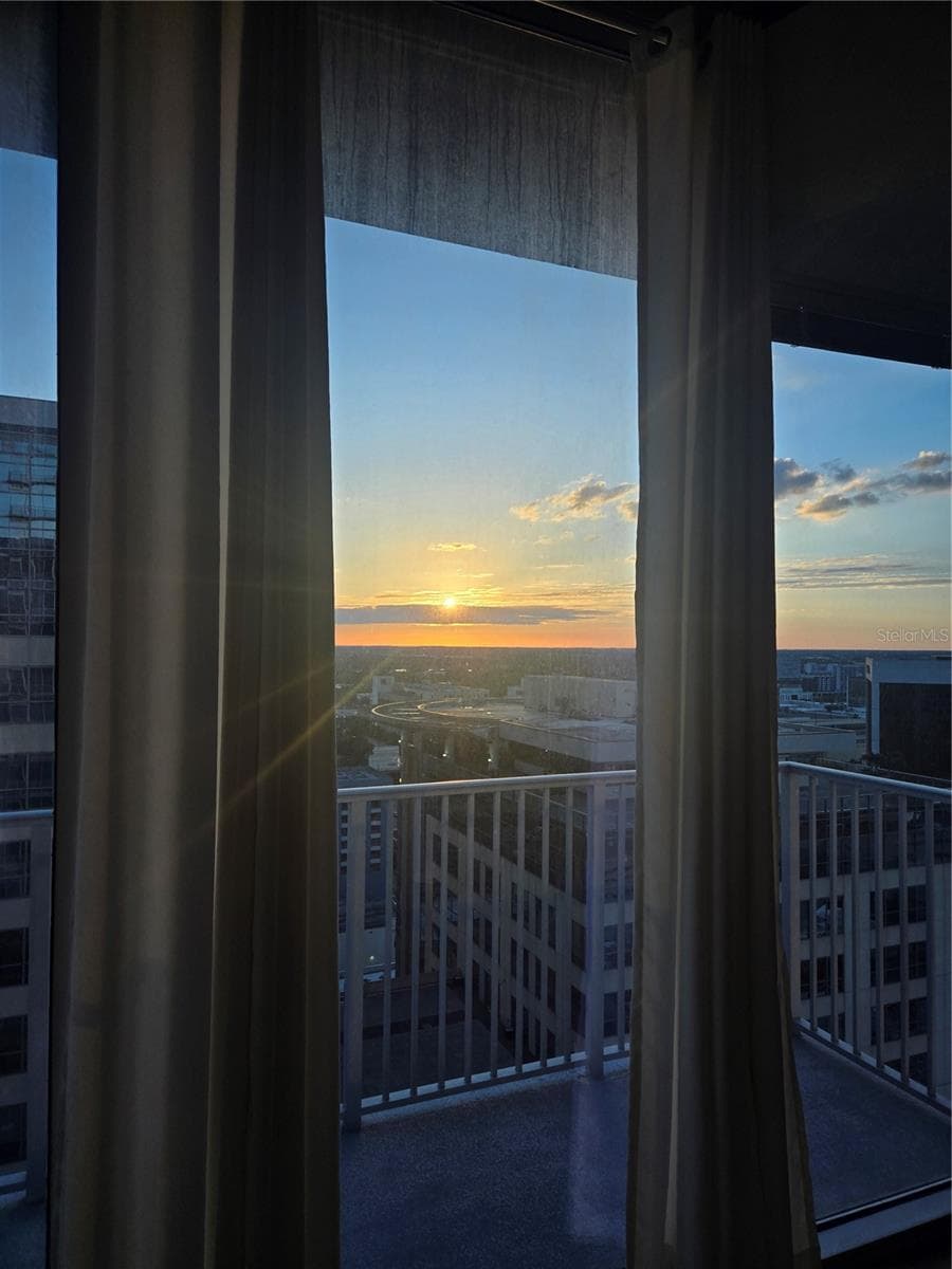 Sunset from Living Room 2 - 155 S COURT AVE #2008, ORLANDO