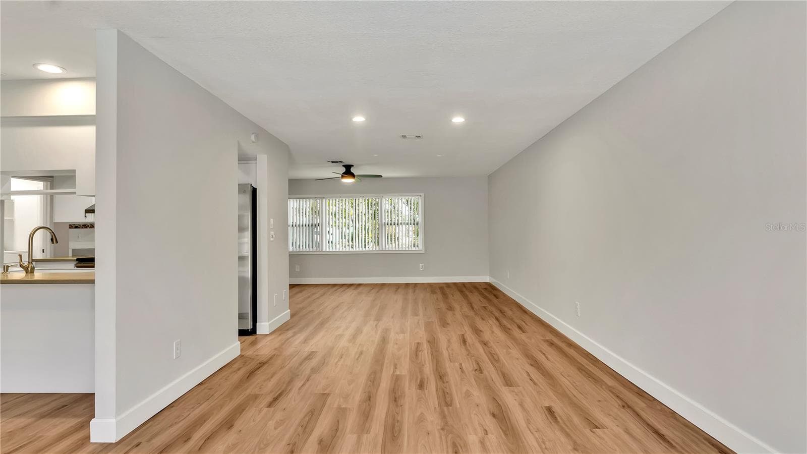 Dining Room (11x21) looking towards the Living Room - 7801 17TH WAY N, ST PETERSBURG