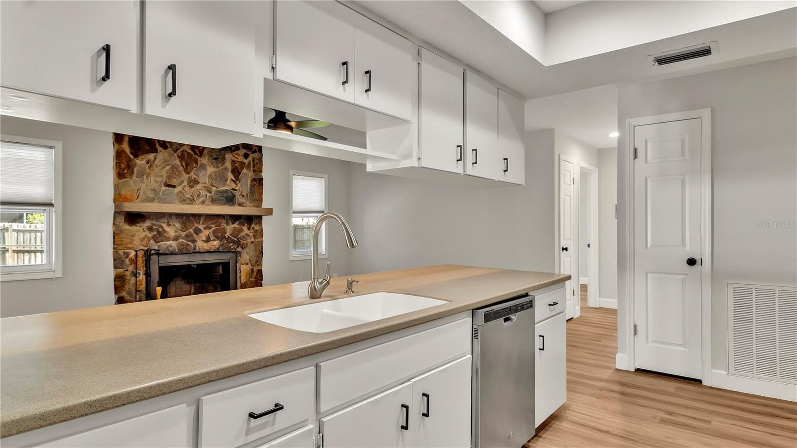 Kitchen looking towards the Family Room and Fireplace - 7801 17TH WAY N, ST PETERSBURG