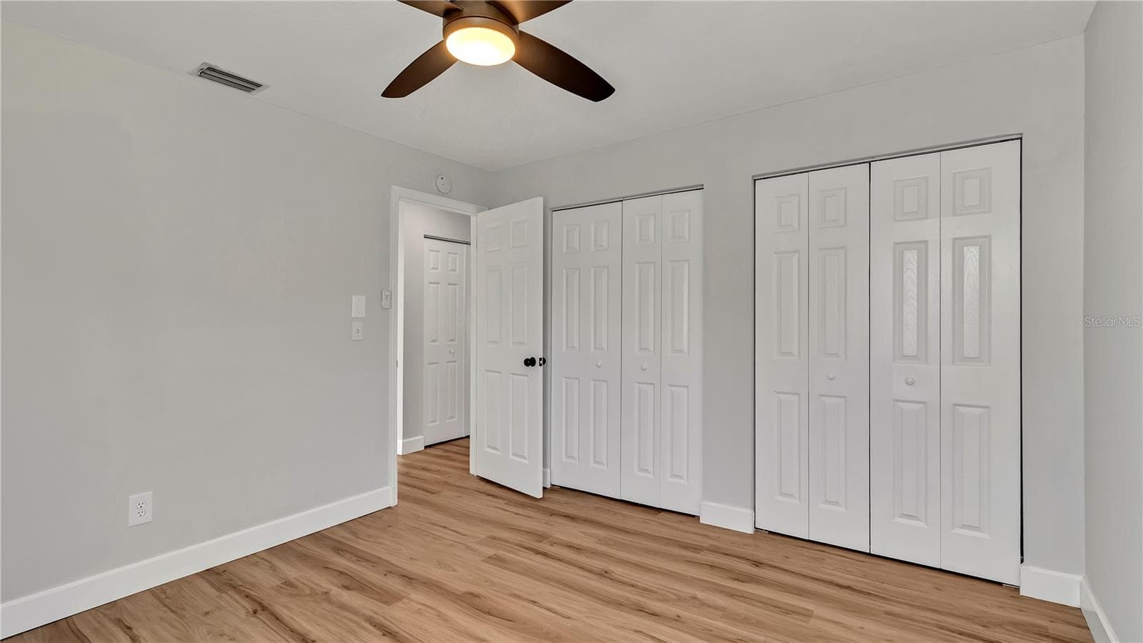 Bedroom 2 (11x12) plus 2 closets - 7801 17TH WAY N, ST PETERSBURG