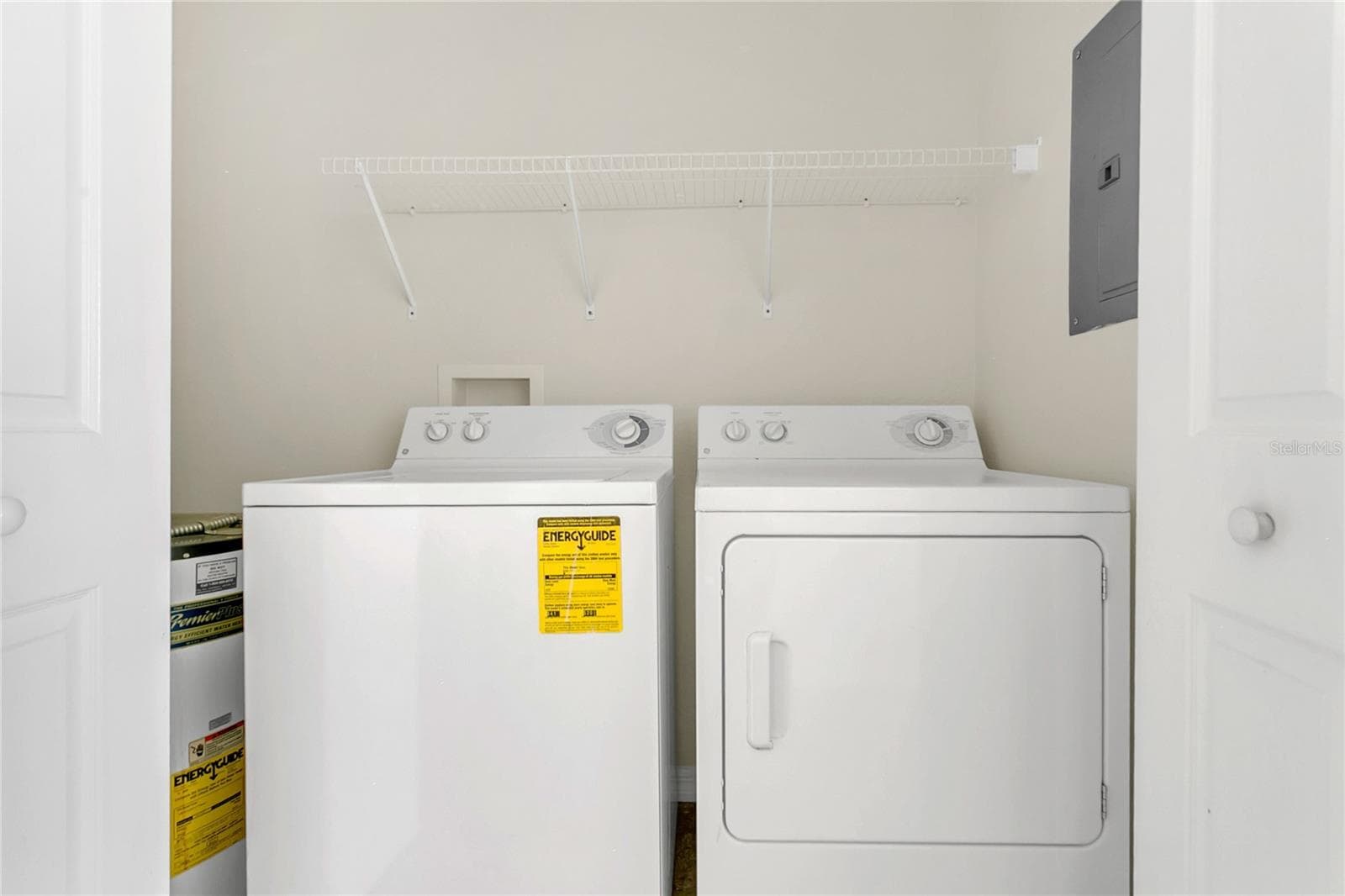 Wash and dryer closet in kitchen area - 8213 CLAIRE ANN DR #108, ORLANDO