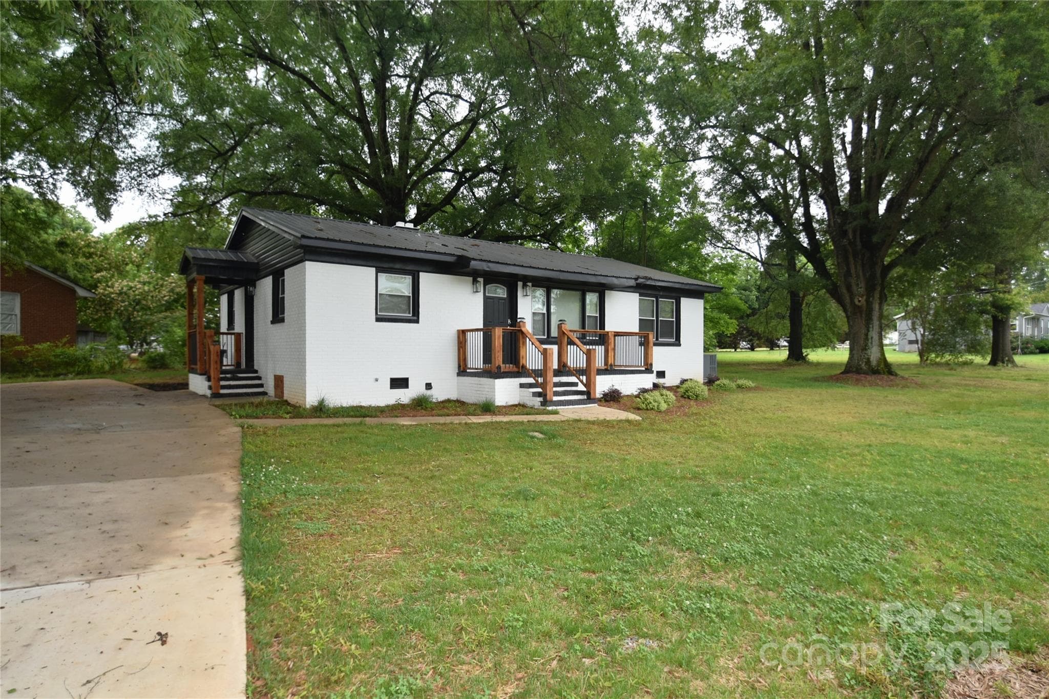 Featuring Three Huge Oak Trees that include a nice brick ranch. - 706 Mcintyre Street, Monroe