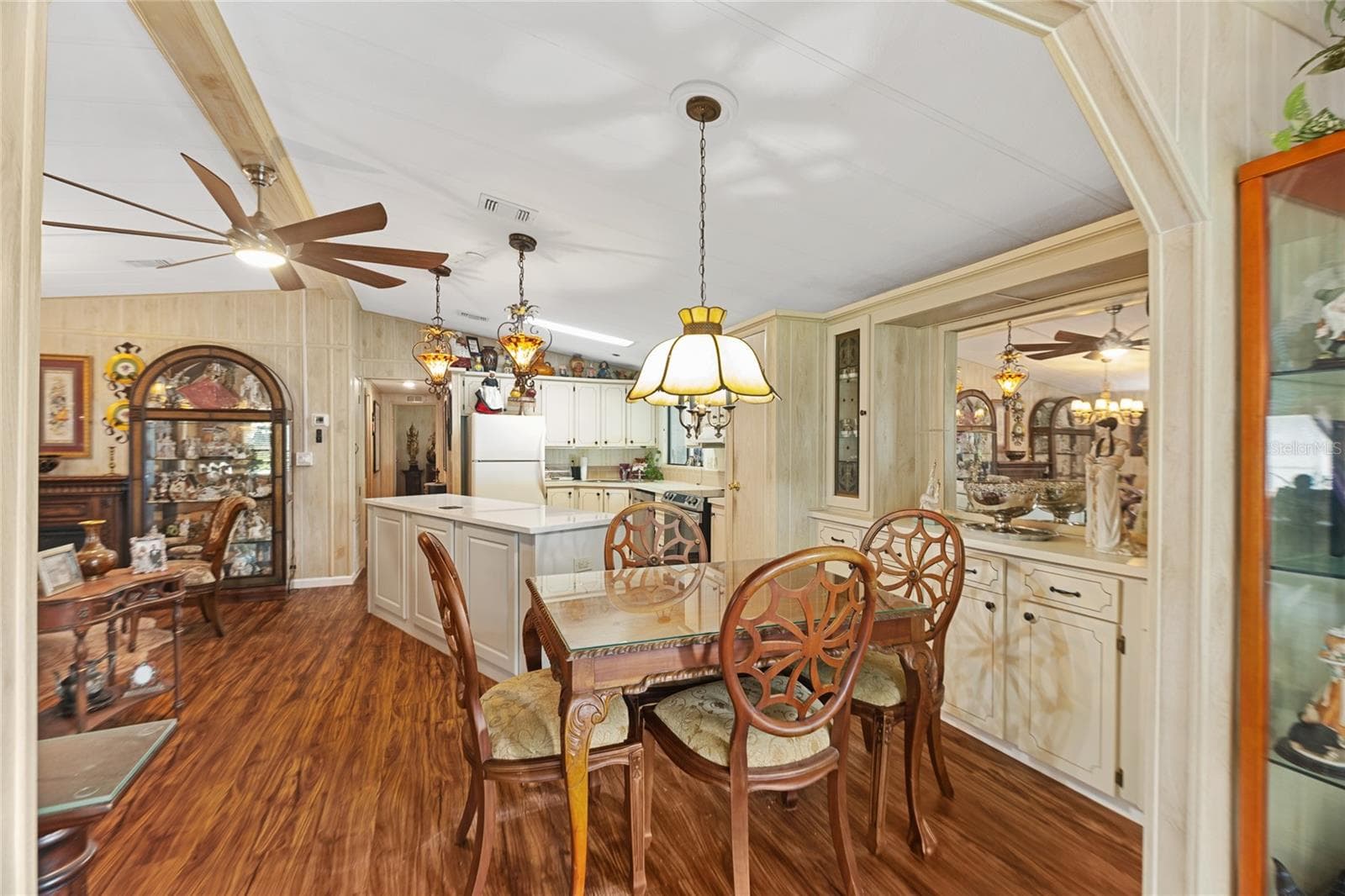 Dining room and kitchen (view from family/front room) - 2002 S CITRUS CIR #1728, ZELLWOOD