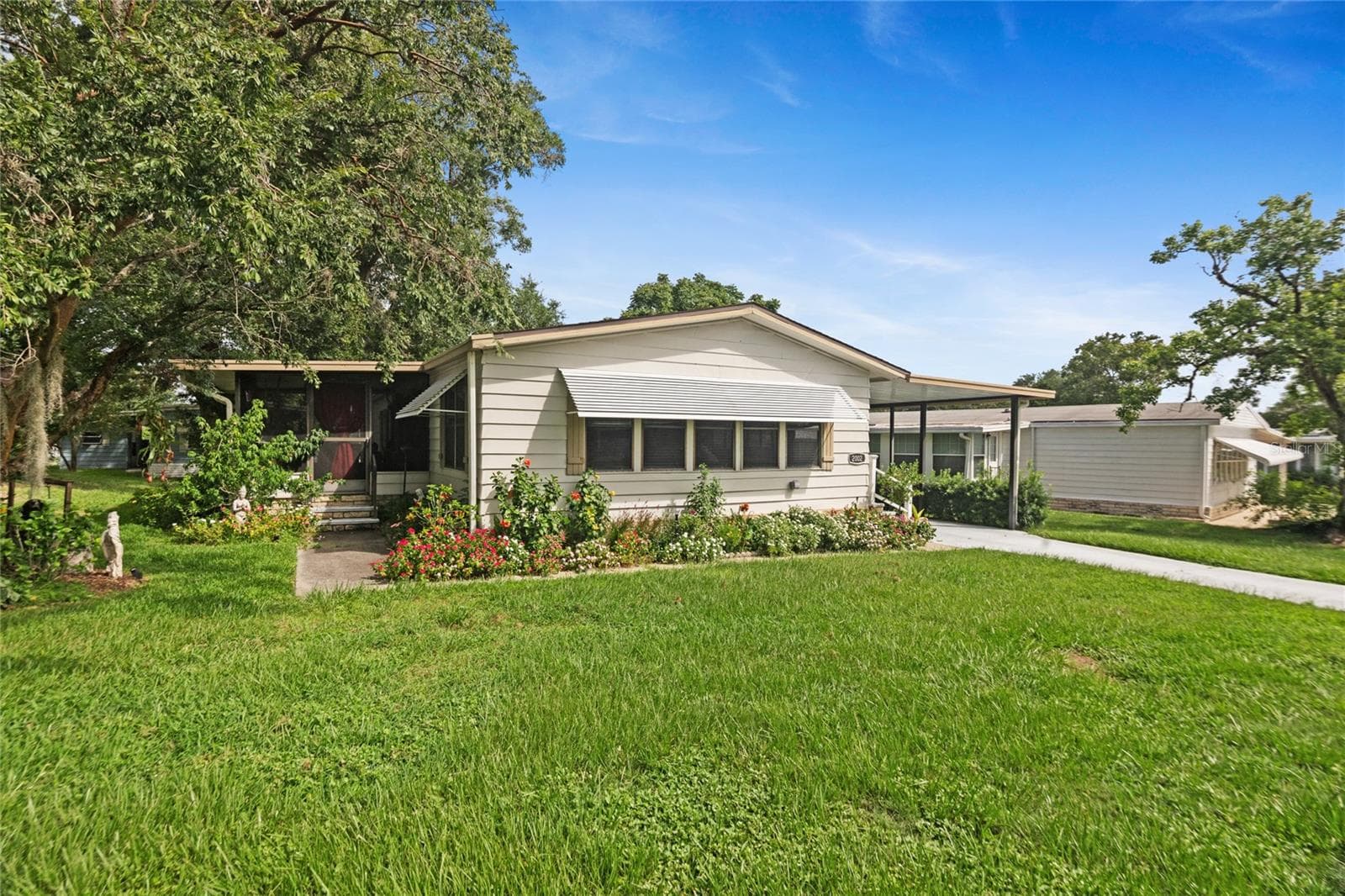 Front of home - 2002 S CITRUS CIR #1728, ZELLWOOD