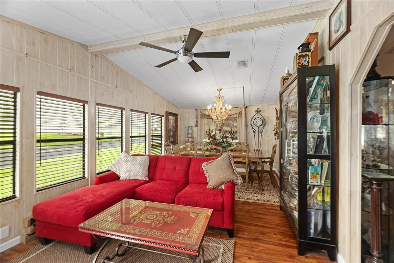 Family/front room configured as lounge and large formal dining - 2002 S CITRUS CIR #1728, ZELLWOOD